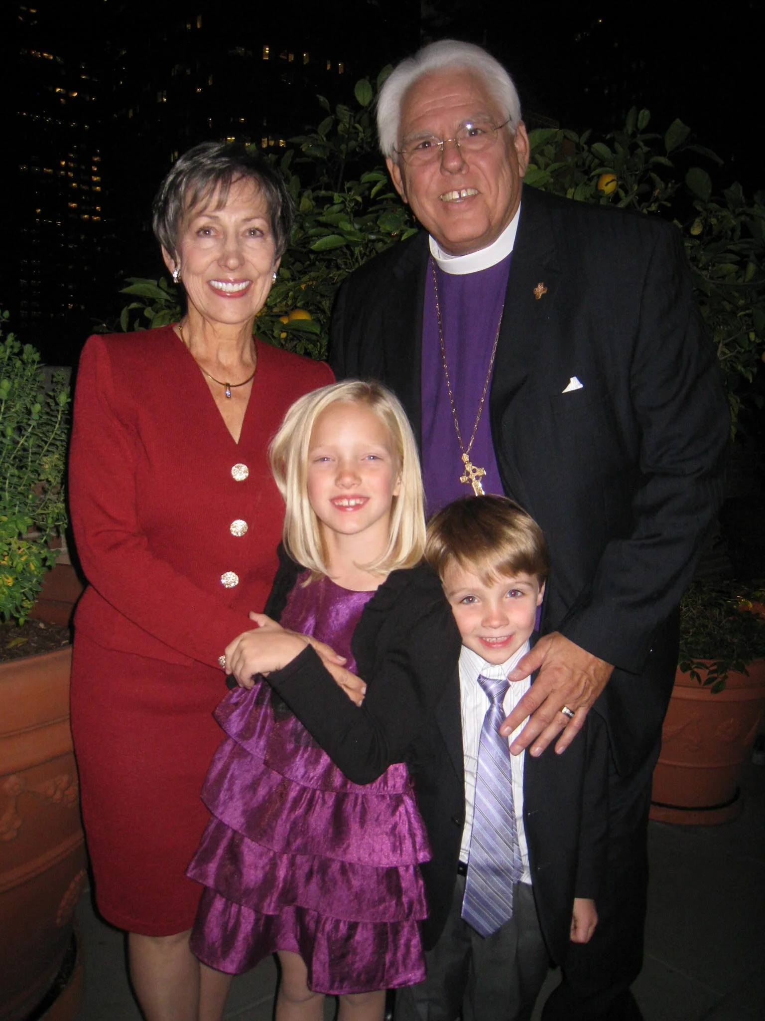 Rt. Rev. J Jon Bruno with his wife Mary and grandchildren