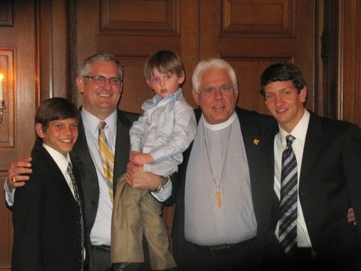 Rt. Rev. Bruno with his son and grandsons