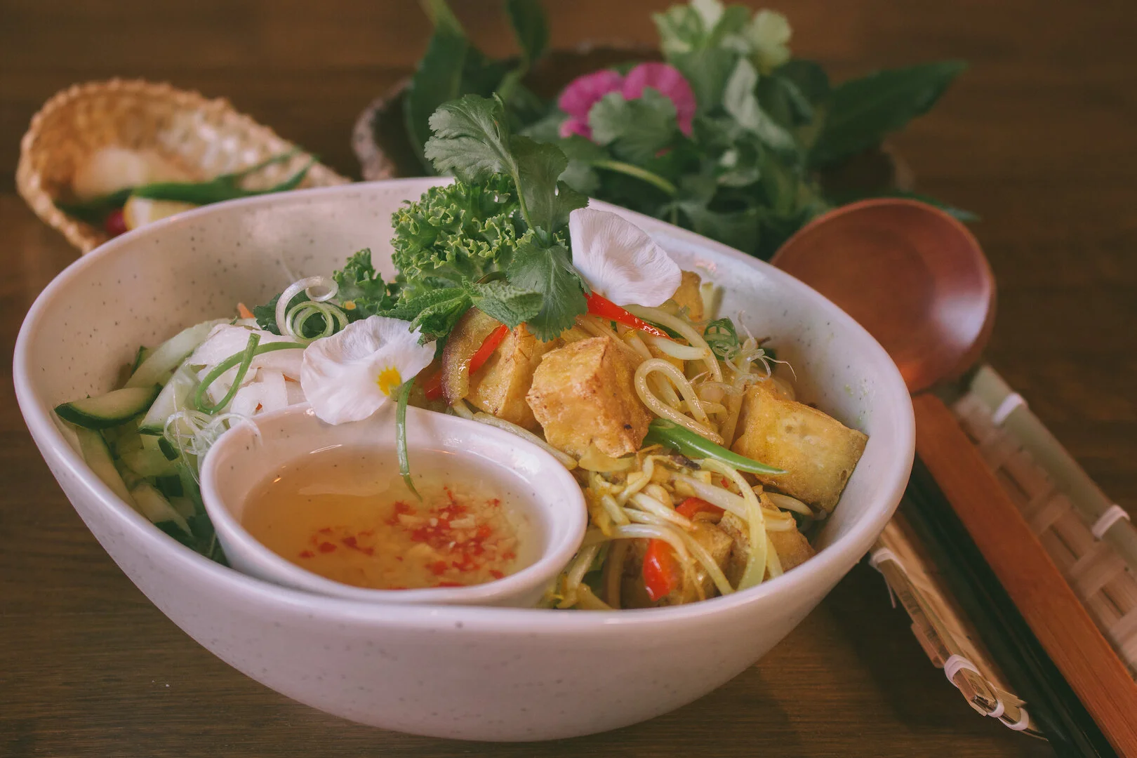 Lemongrass, vermicelli noodle with deep fried tofu, fresh herbs & vegan chilli sauce