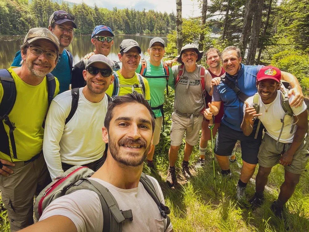 Fathers and sons hiking in the woods