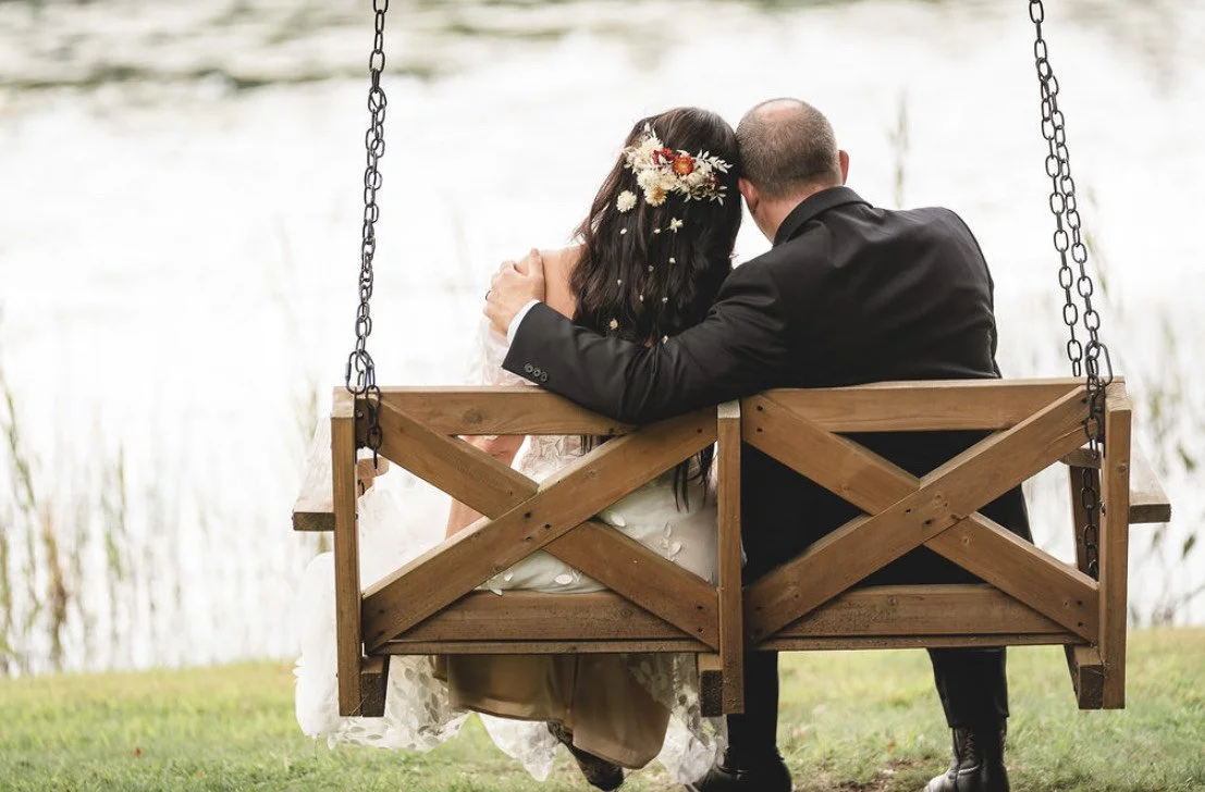 vanderkamp-couple-ceremony-lake.jpeg