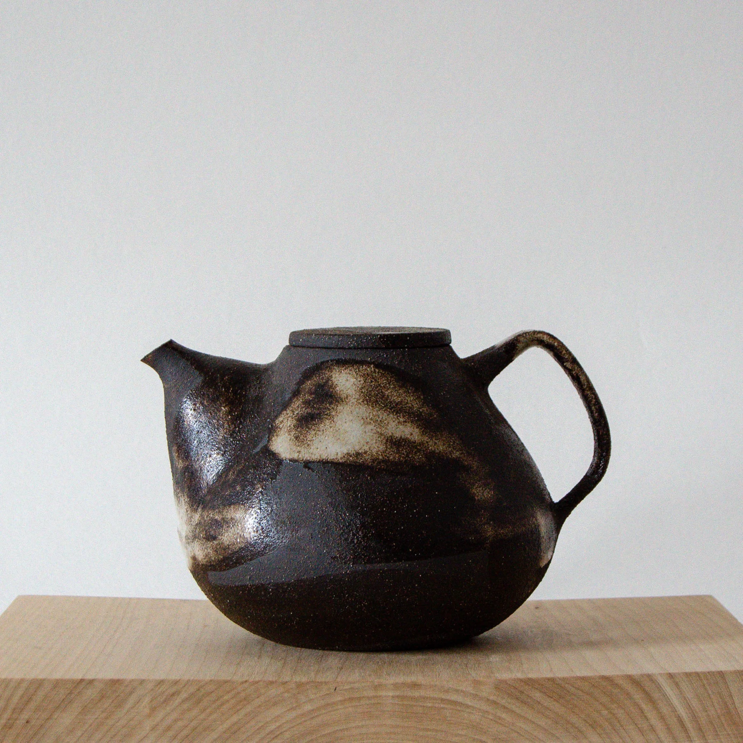 Dark painted teapot