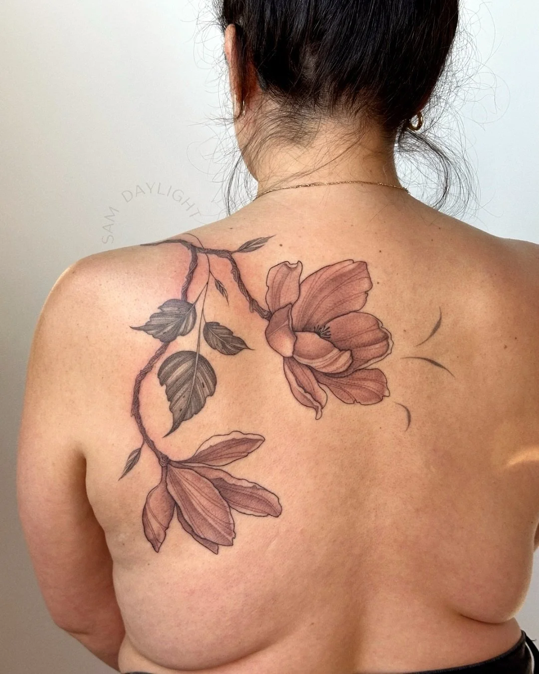 Beautiful start to a magnolia back piece for my friend @hairbestiebri ~ I can&rsquo;t wait to add more flowers this fall 🌸 Bri is the one who keeps my hair looking fabulous, so definitely check out her Instagram!
.
.
.
#PortlandTattooArtist #Oregont