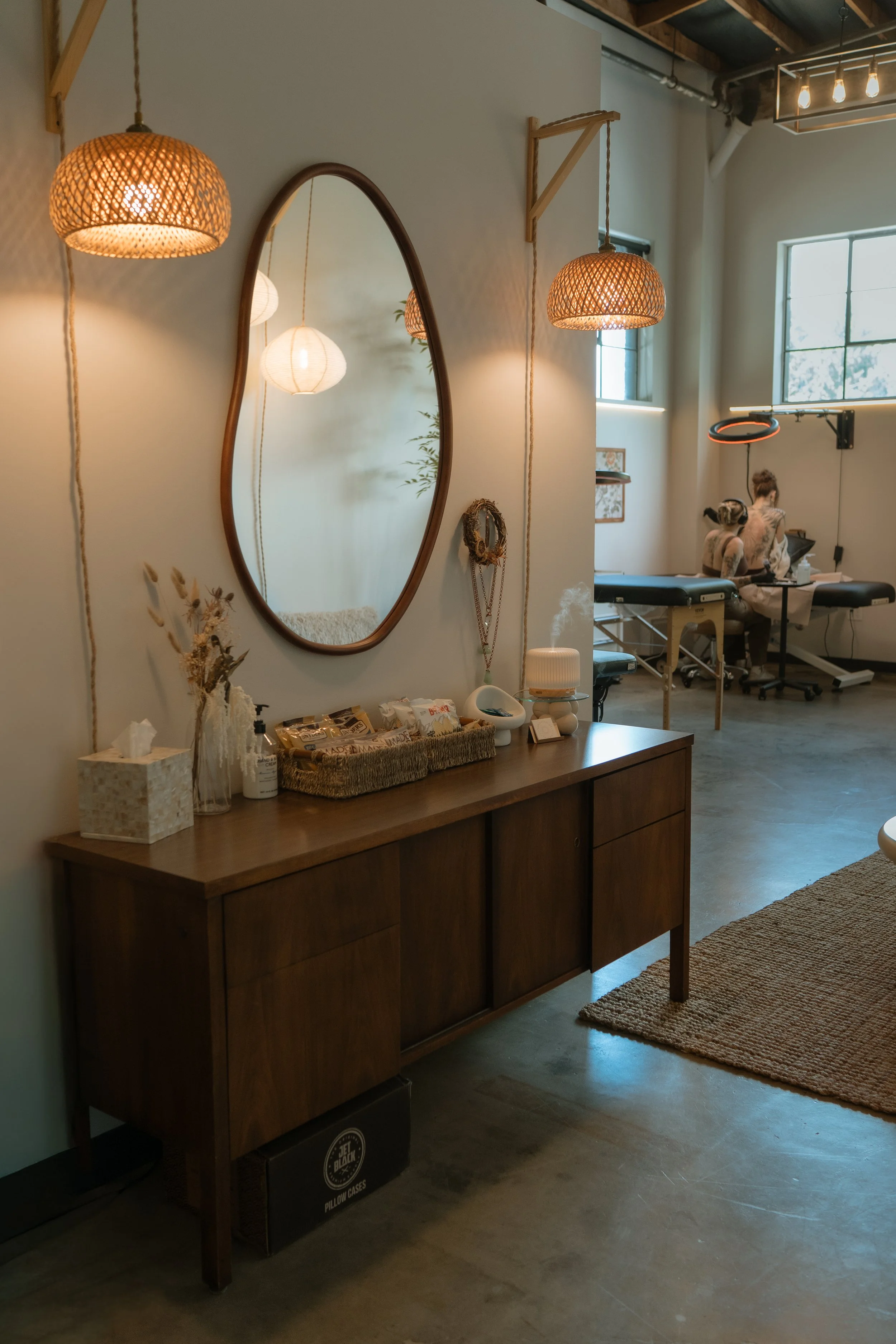 Entry table with provided snacks for clients.