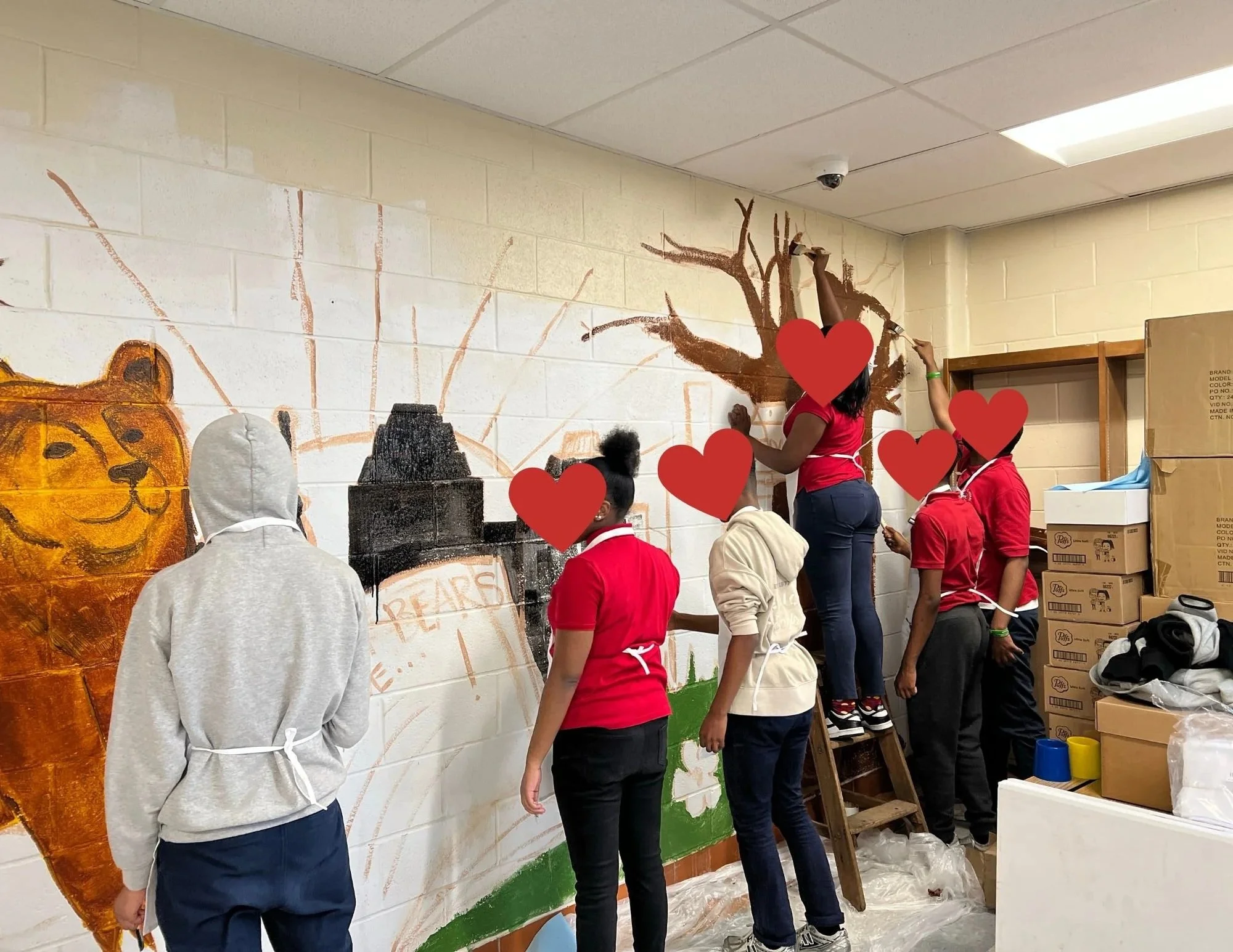 Students working on a Mural for the Library