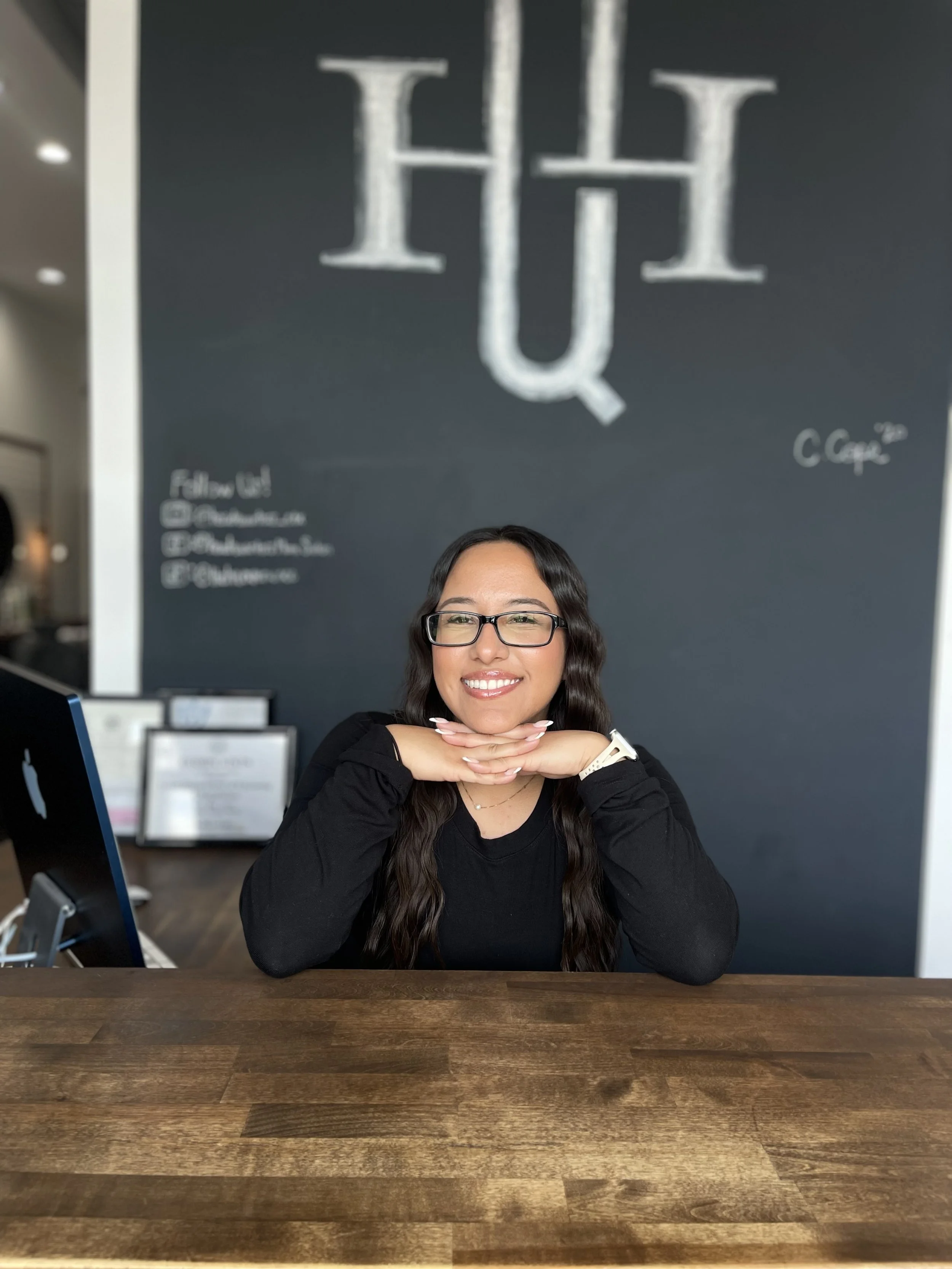 Portrait of Favi, Front Desk Receptionist at Headquarters Men's Salon