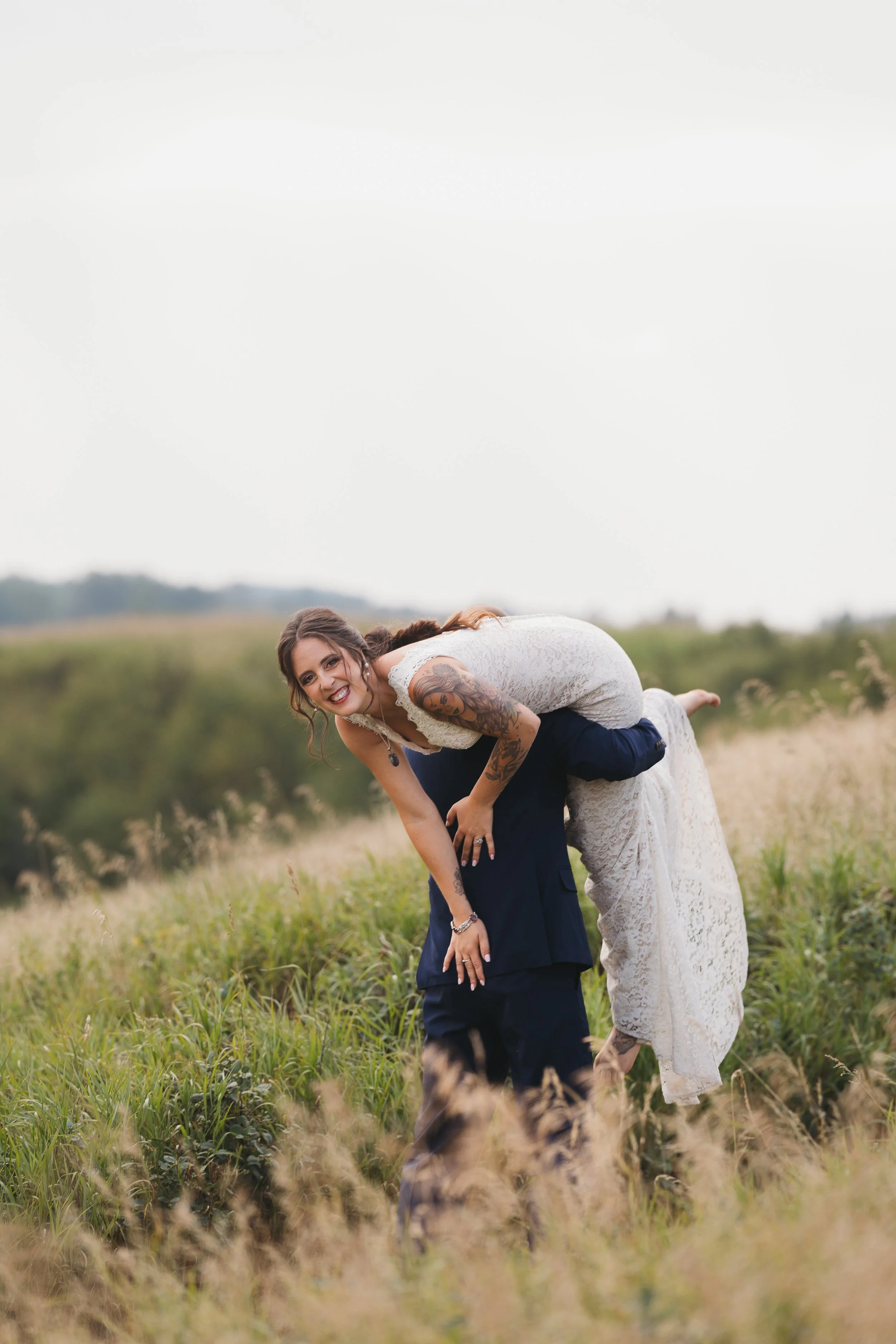 bride lifted over shoulder in tofield alberta