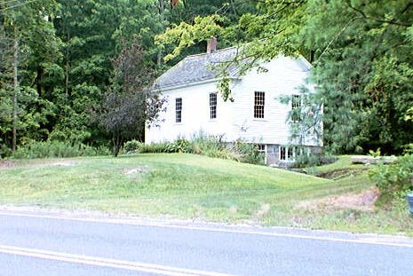 The Barkhamsted Center Schoolhouse is now located on Center Hill Road (Route 181) very near the geographic center of the town. In 1979 the Historical Society moved it to this site from the original location on what is now the banks of the Barkhamste