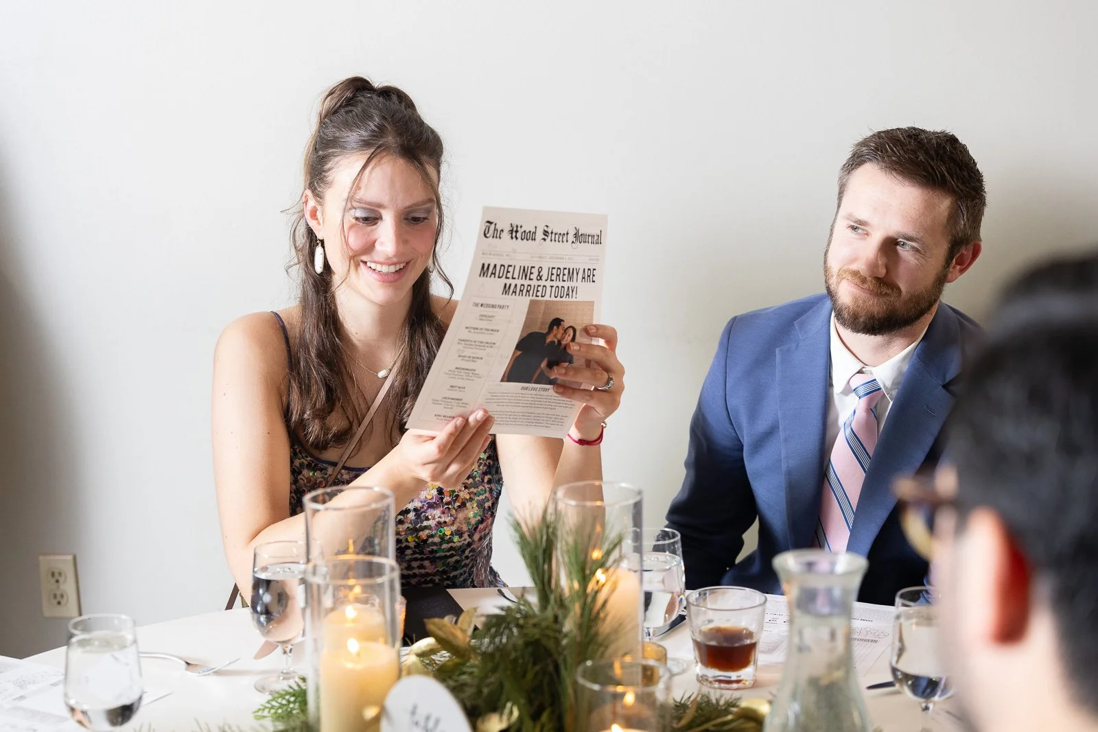 Newlyweds on The Atrium rooftop in Shorewood Wisconsin photographed by Milwaukee wedding photographer. Winter Wedding.