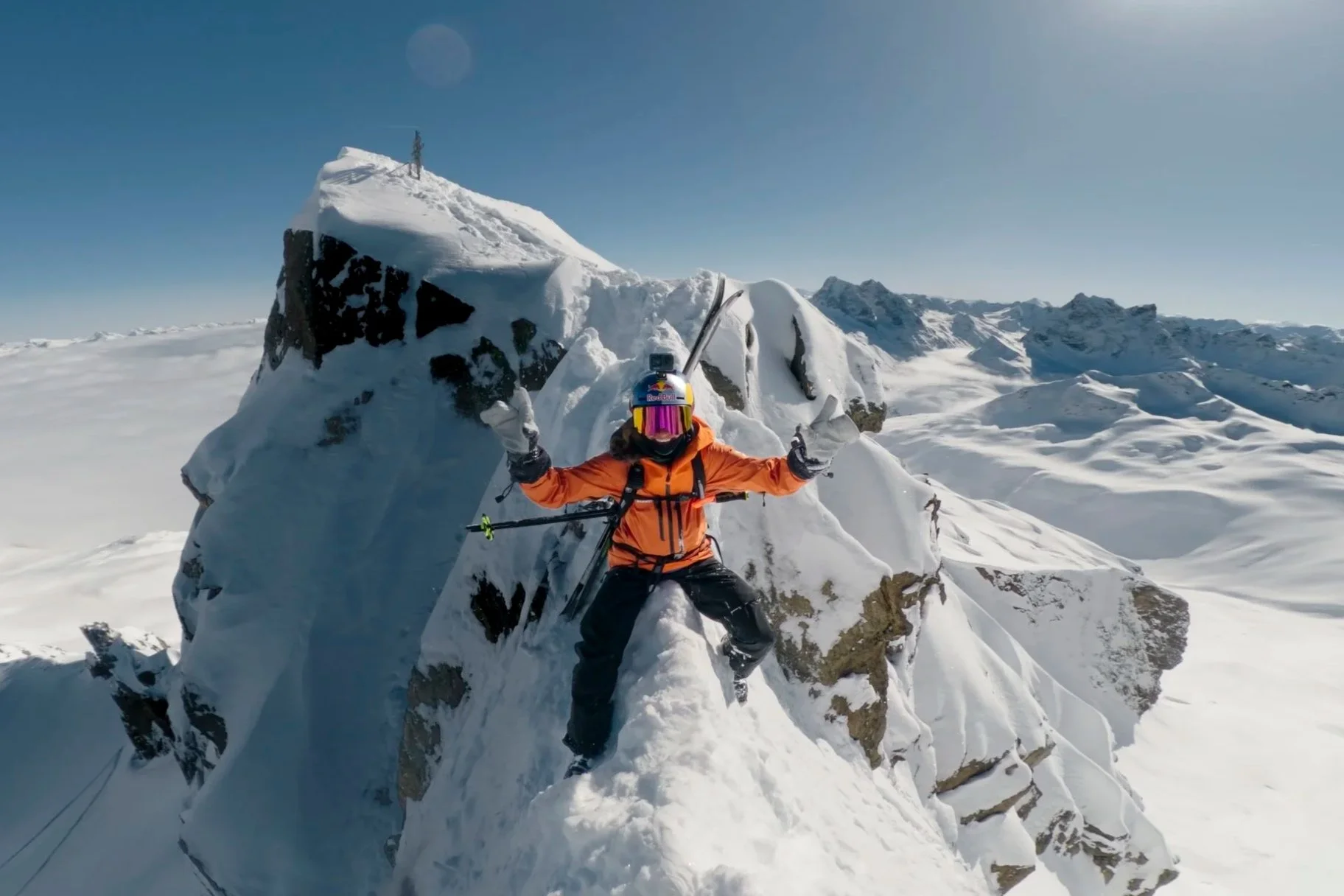Nadine Wallner on a snow-covered summit ridge during the BACKYARD project with Red Bull and Mammut.