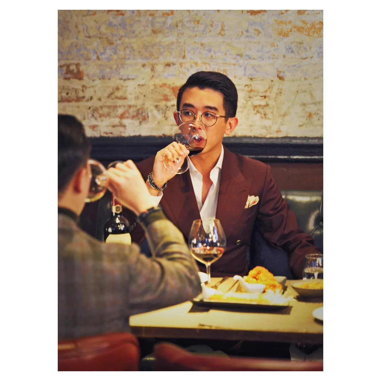 An inspiration for your upcoming date - a classic double breasted suit in burgundy, a deep red shade with a pop of purple that&rsquo;s slightly more playful but looks exceptionally sophisticated, whether under the sunlight or yellow spotlight.