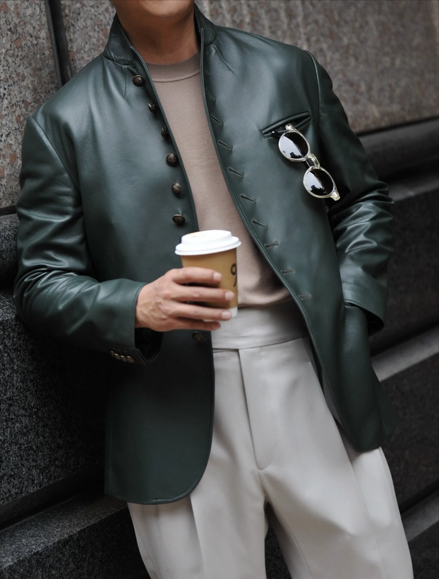 We’re more than just suit tailors—at our shop, custom clothing means limitless creativity. From this unconventional lambskin leather jacket, highlighted by a striking array of brass buttons, to any piece you can imagine, we bring your sty