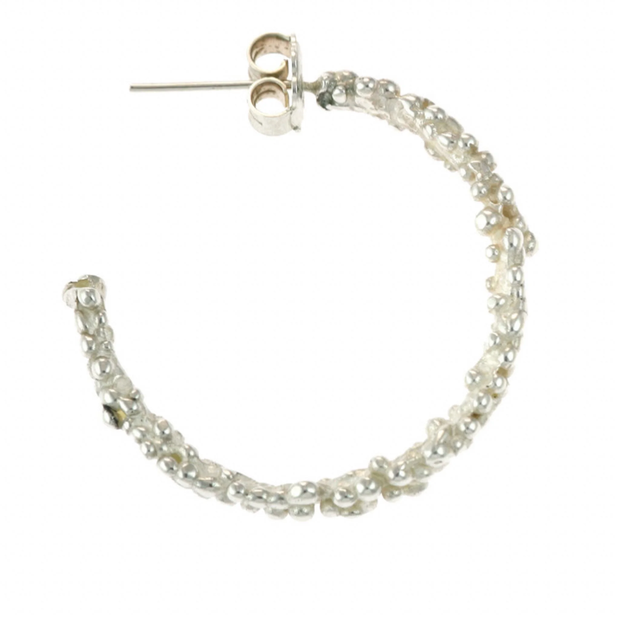 Large silver hoop earrings with bubble dot granulation texture side view on white background- Militza Ortiz Jewellery