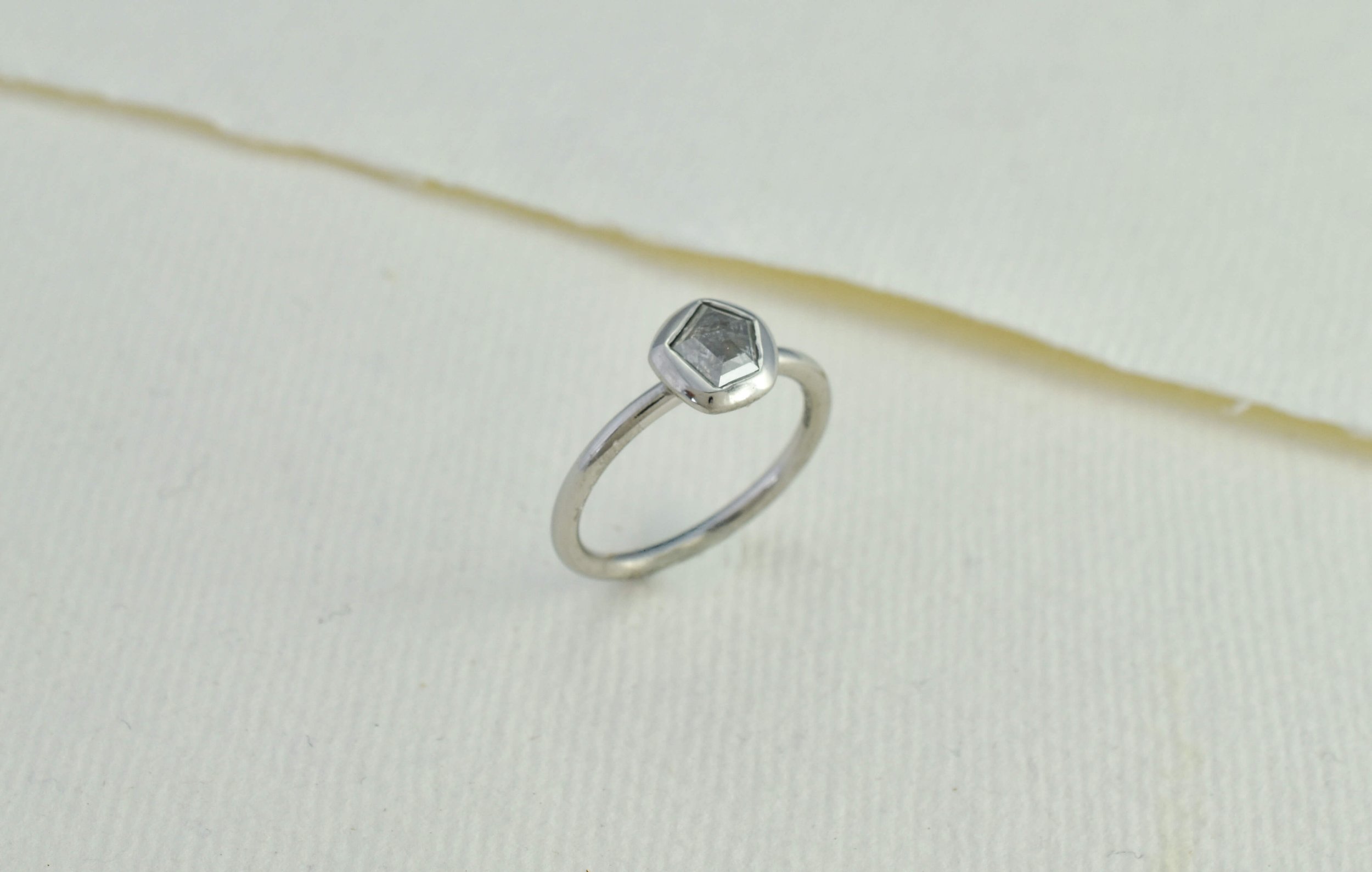 A High-School Sweetheart Engagement Proposal with an Irregular Salt and Pepper Diamond Ring