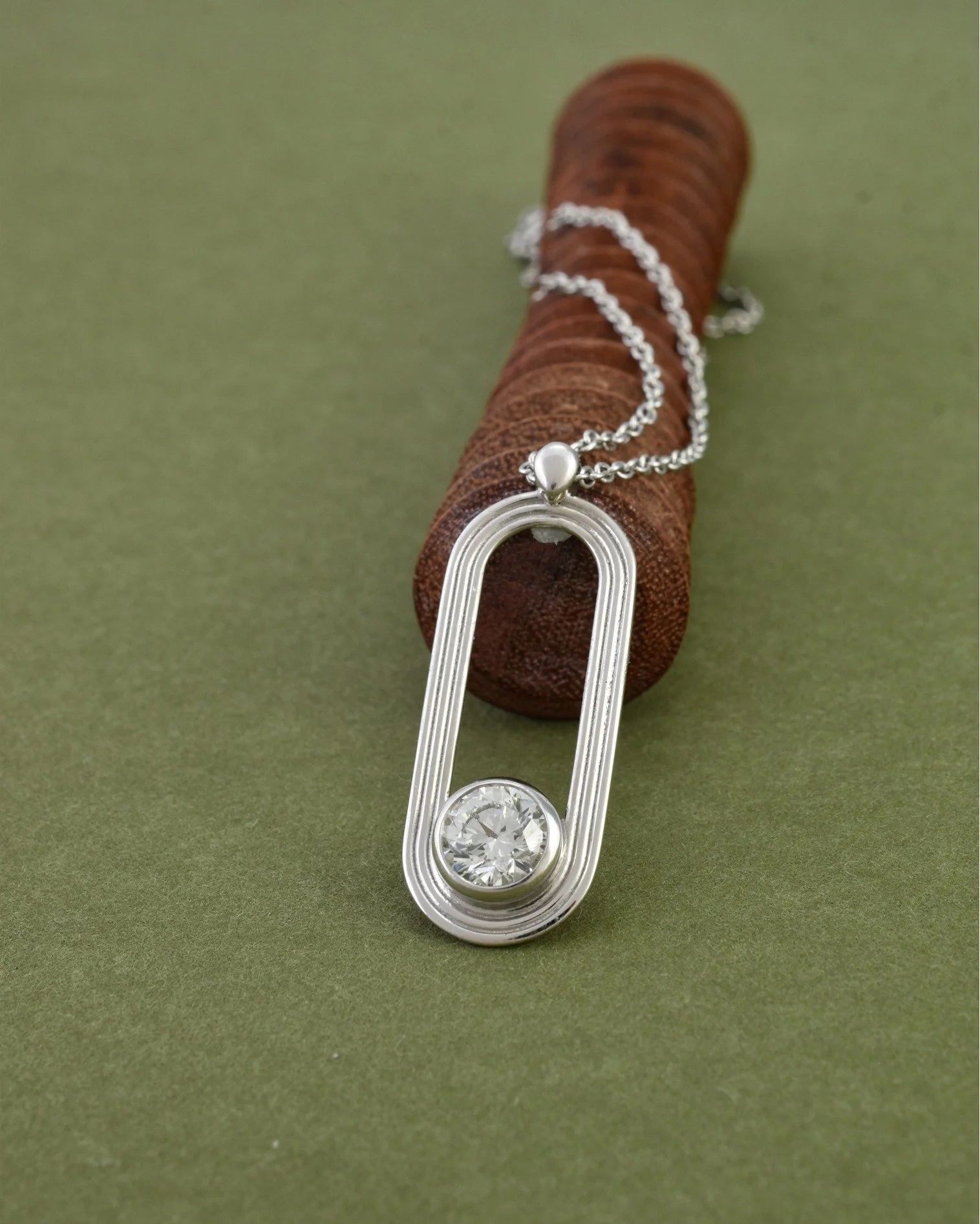 Why wait for someone else to buy you diamonds? ✨ After three decades building an amazing career in sports, my client marked her retirement with a stunning, custom-made platinum and natural diamond pendant. 

We worked together to create a sleek, mode