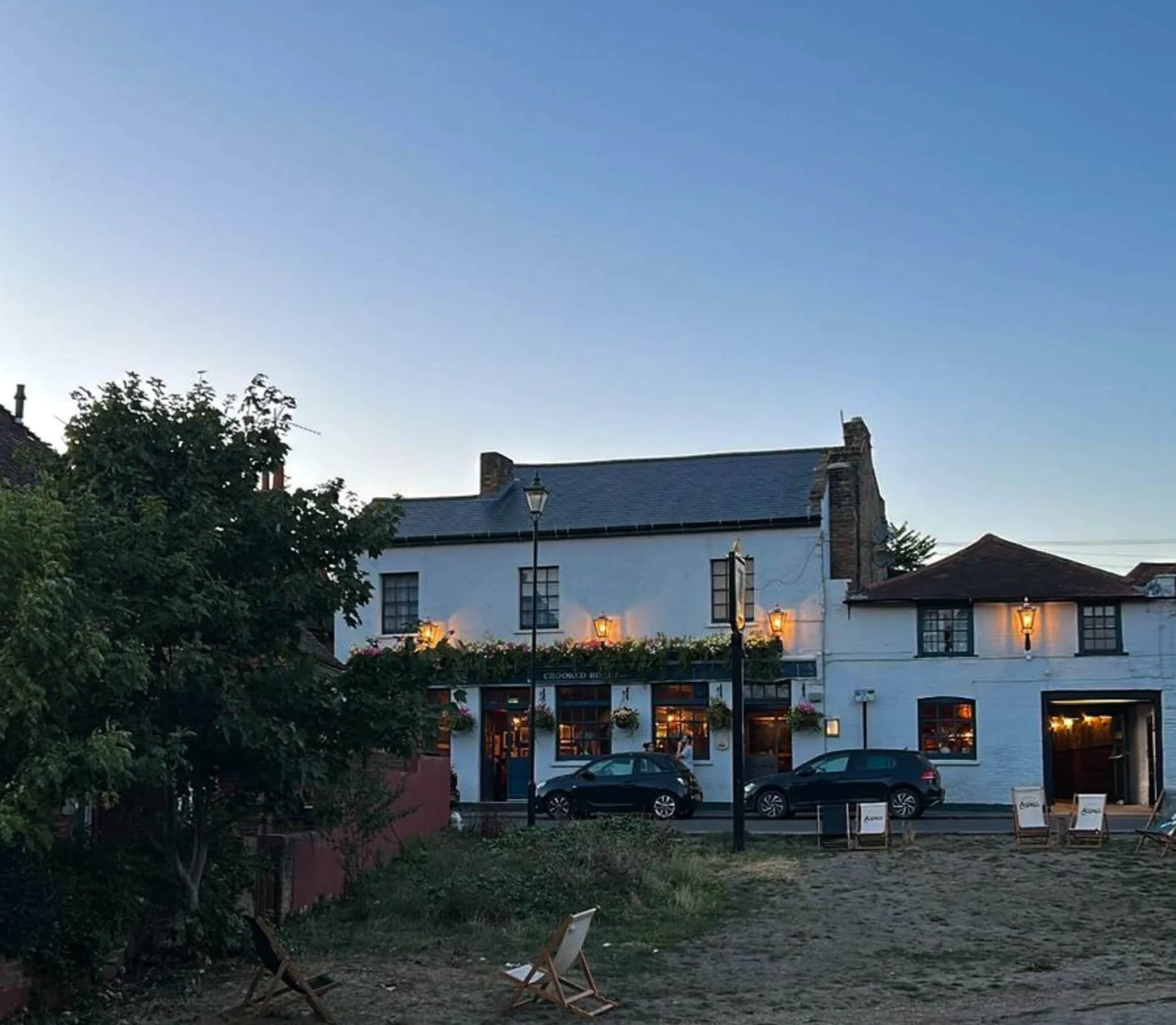 English pub Crooked Billet at sunset.