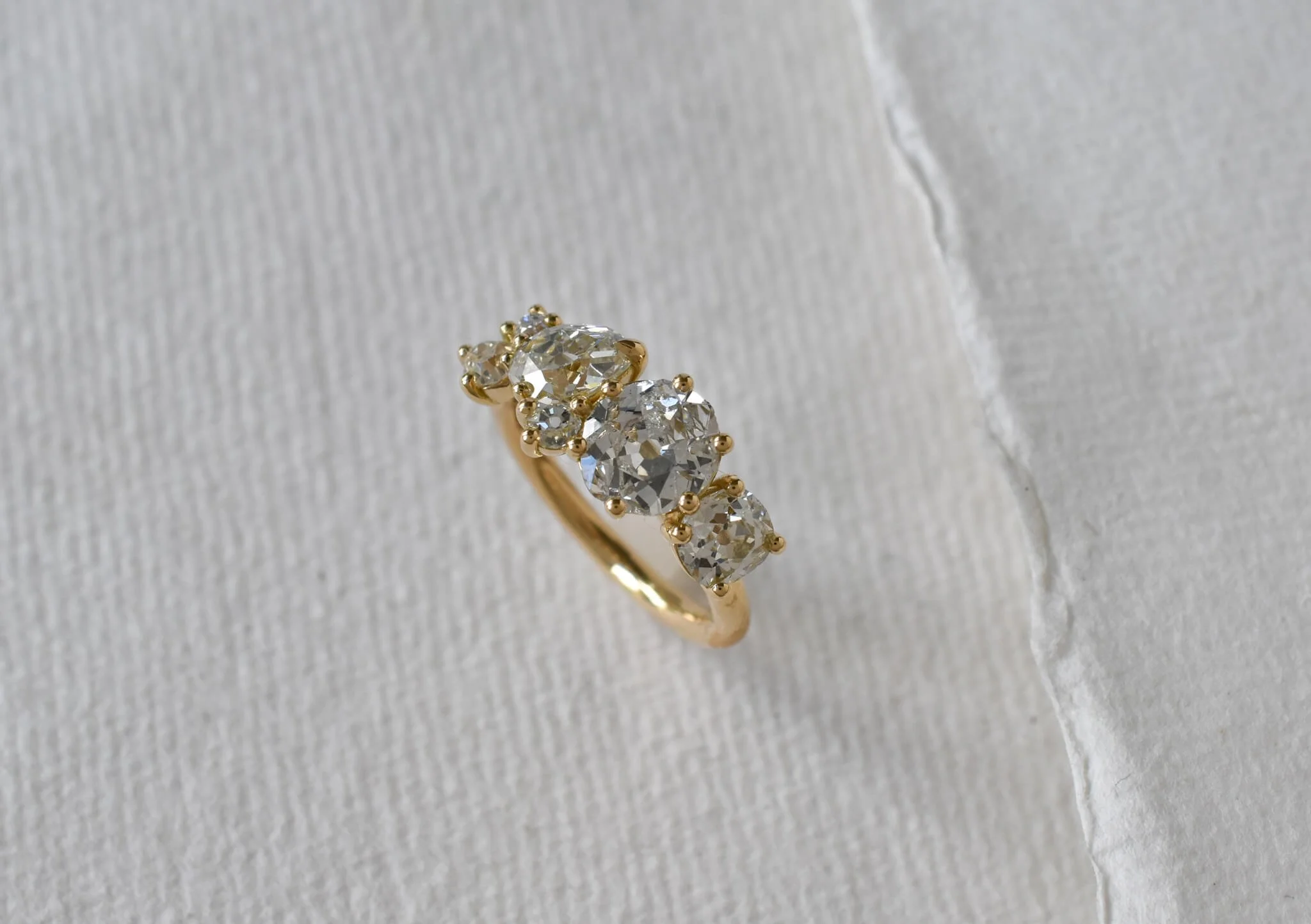 6 diamond ring in gold 3/4 top view