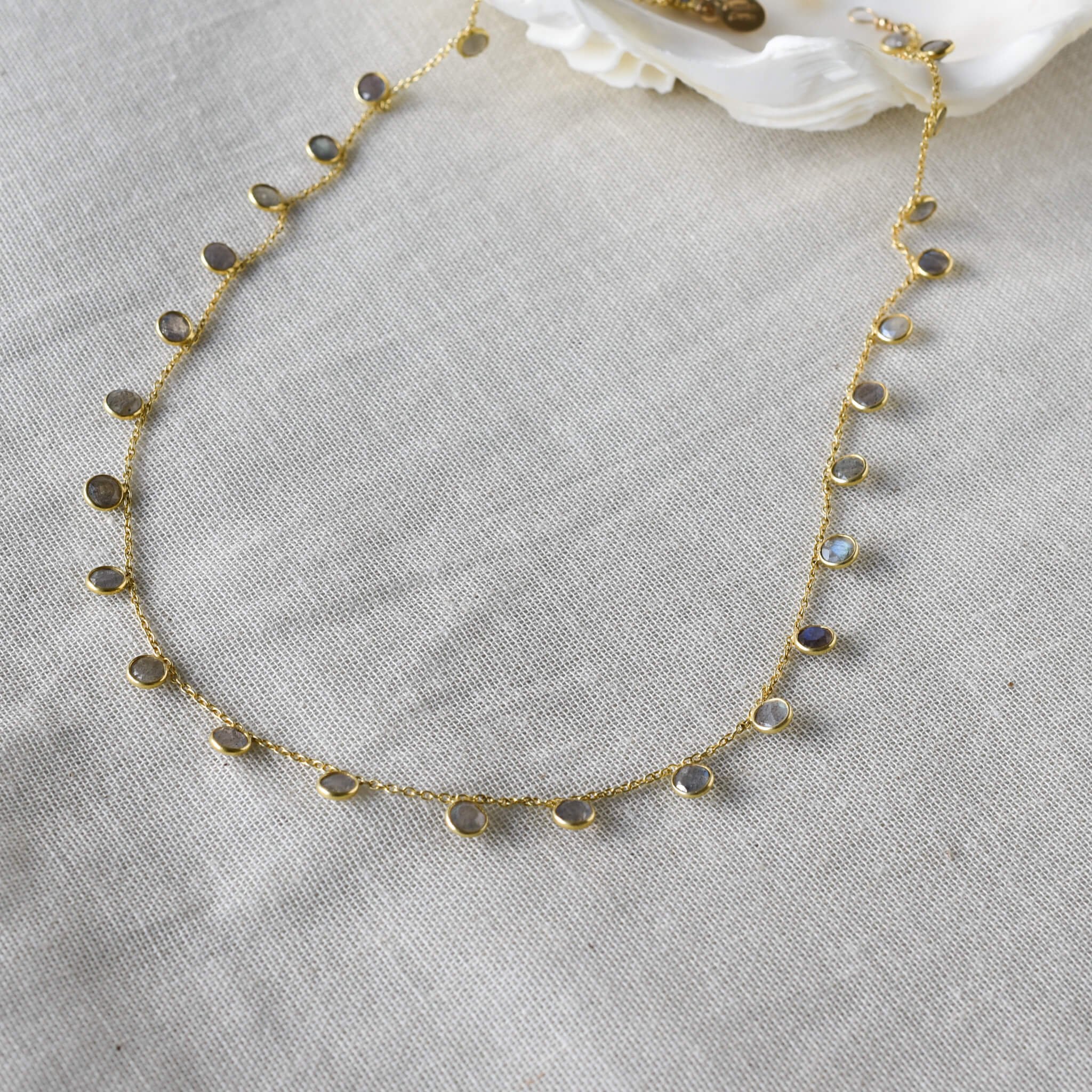 Labradorite drop gold necklace choker on linen