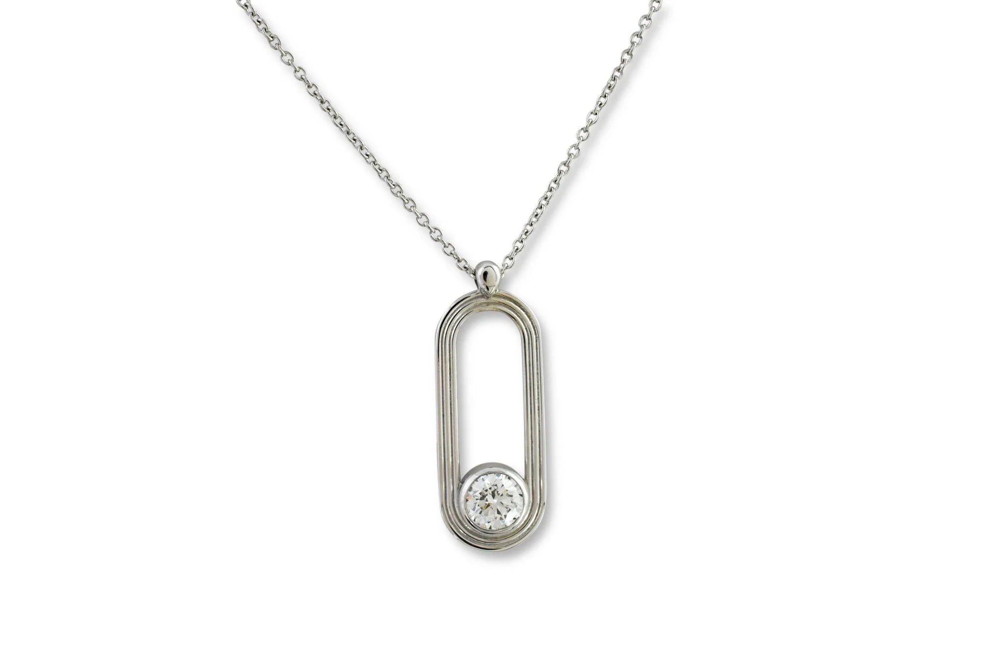 Round diamond set in a track pendant necklace platinum metal