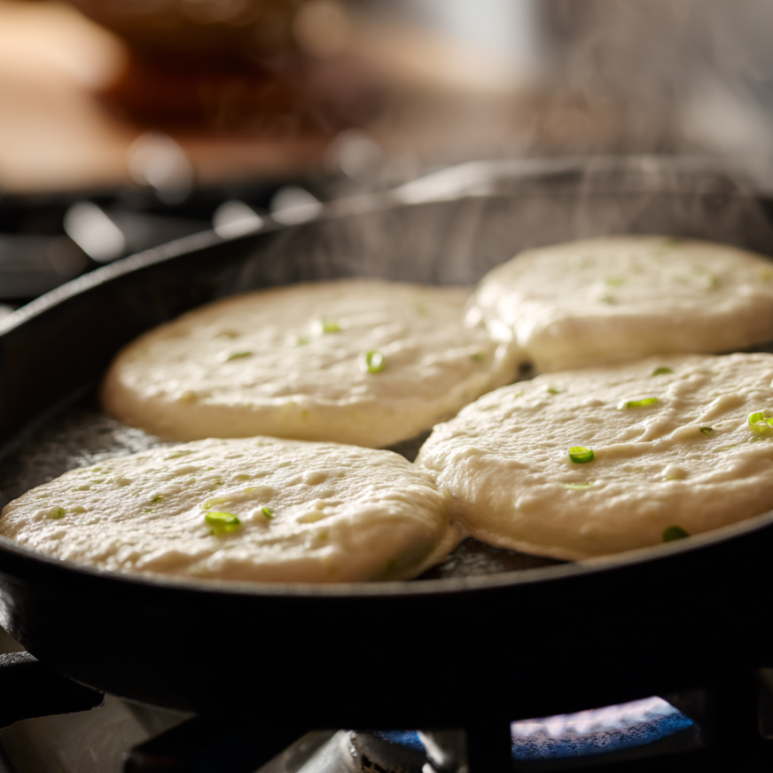 pancake batter poured into skillet