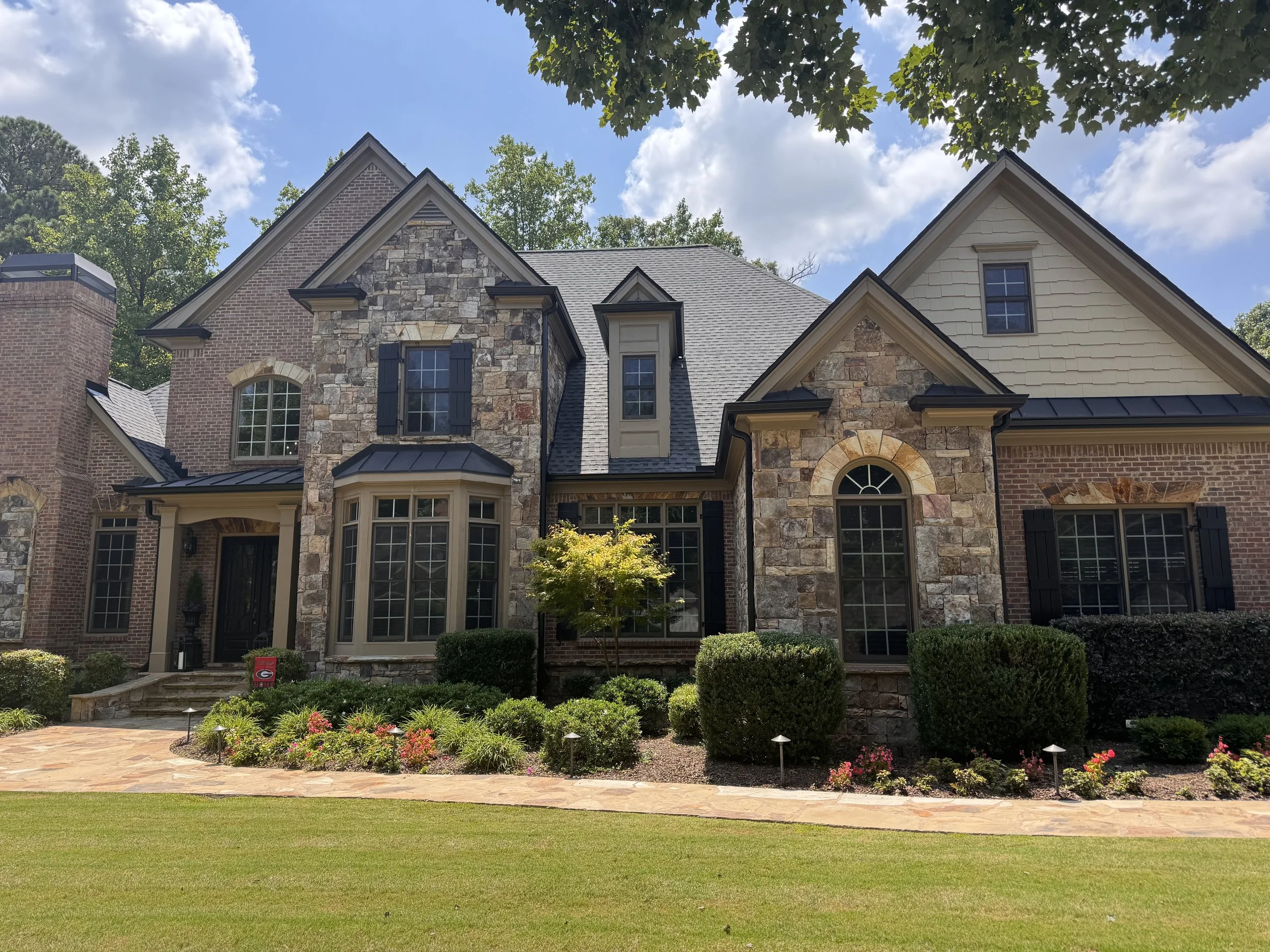 Completed residential roofing project by Elite Roofing & Restoration in Cumming, Georgia