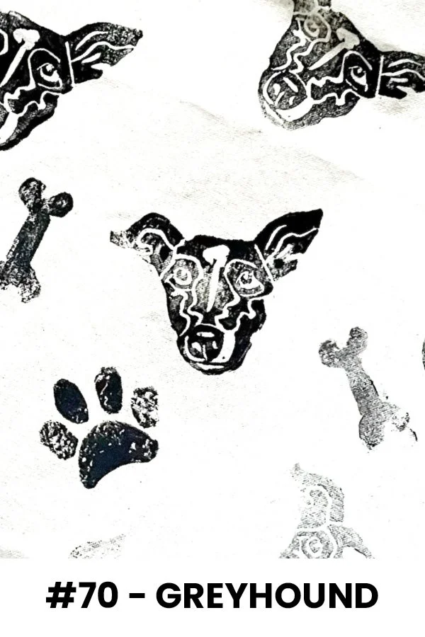 Pattern of stylized dog faces, paw prints, and bones in black and white, with the text '#70 - GREYHOUND' at the bottom.