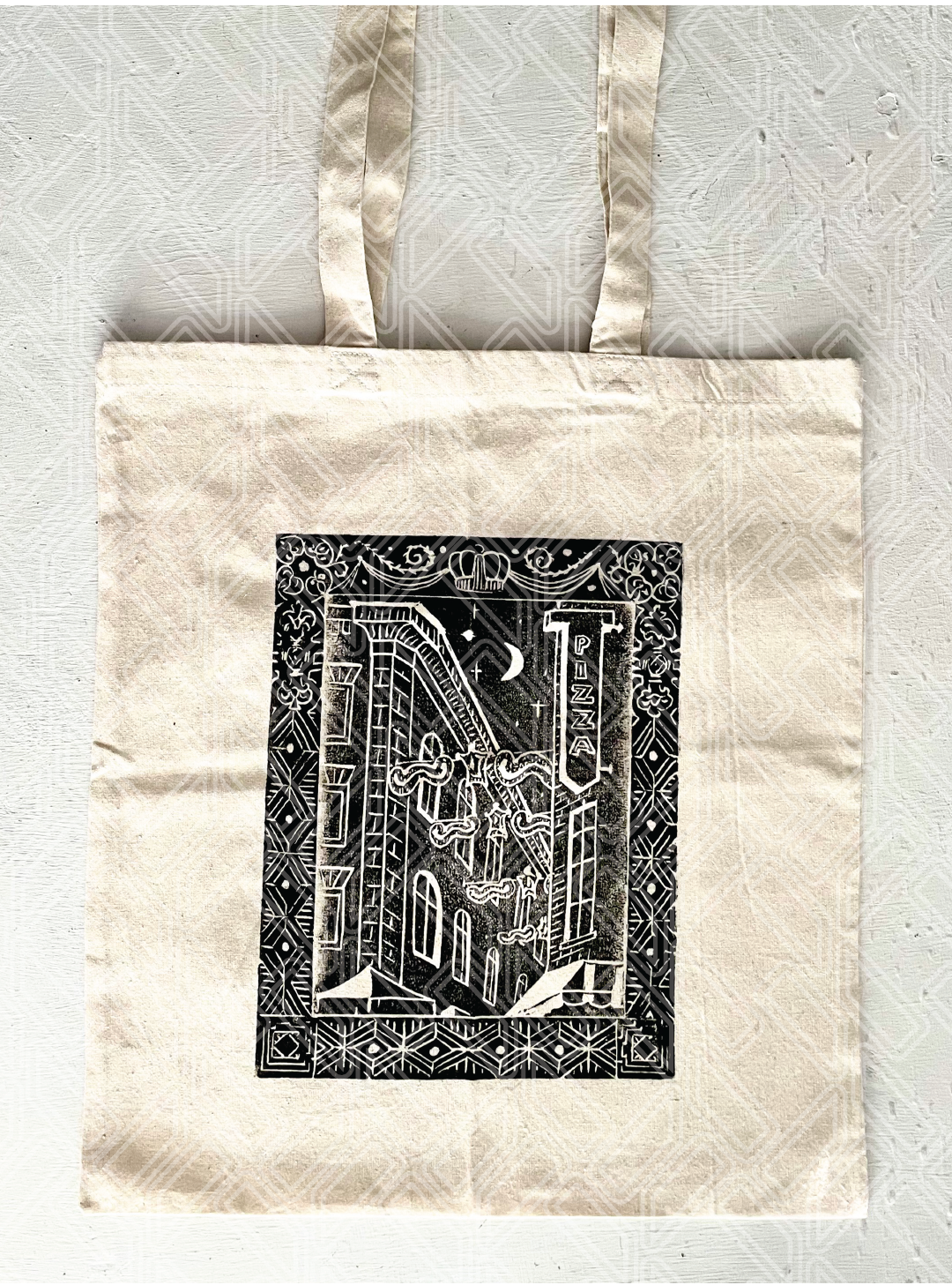 N - watermarked natural tote in black.png