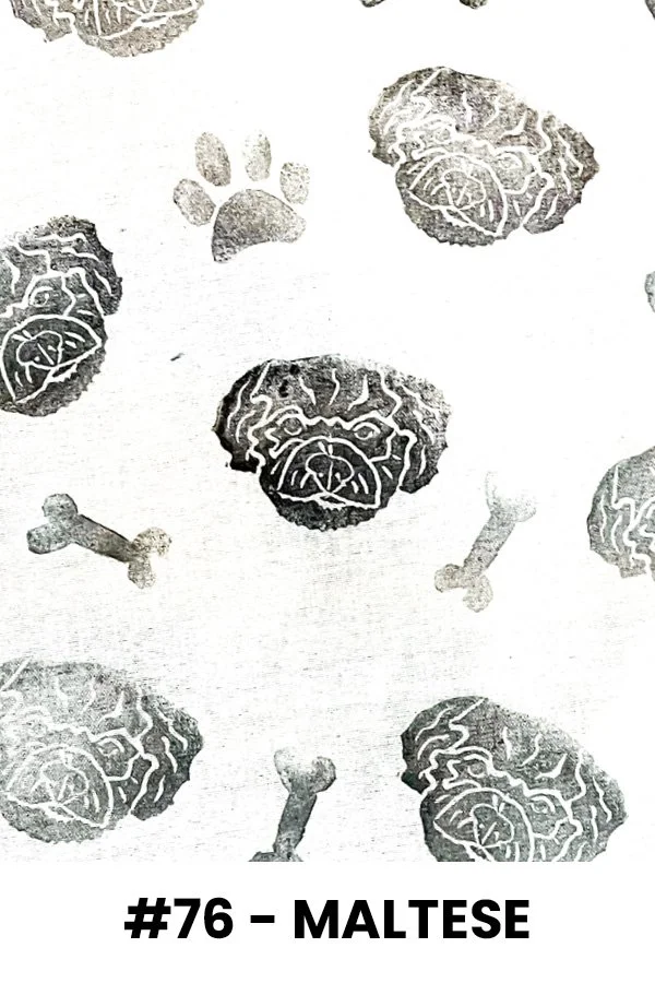 Pattern of dog faces and bones with the label '#76 - Maltese' at the bottom.