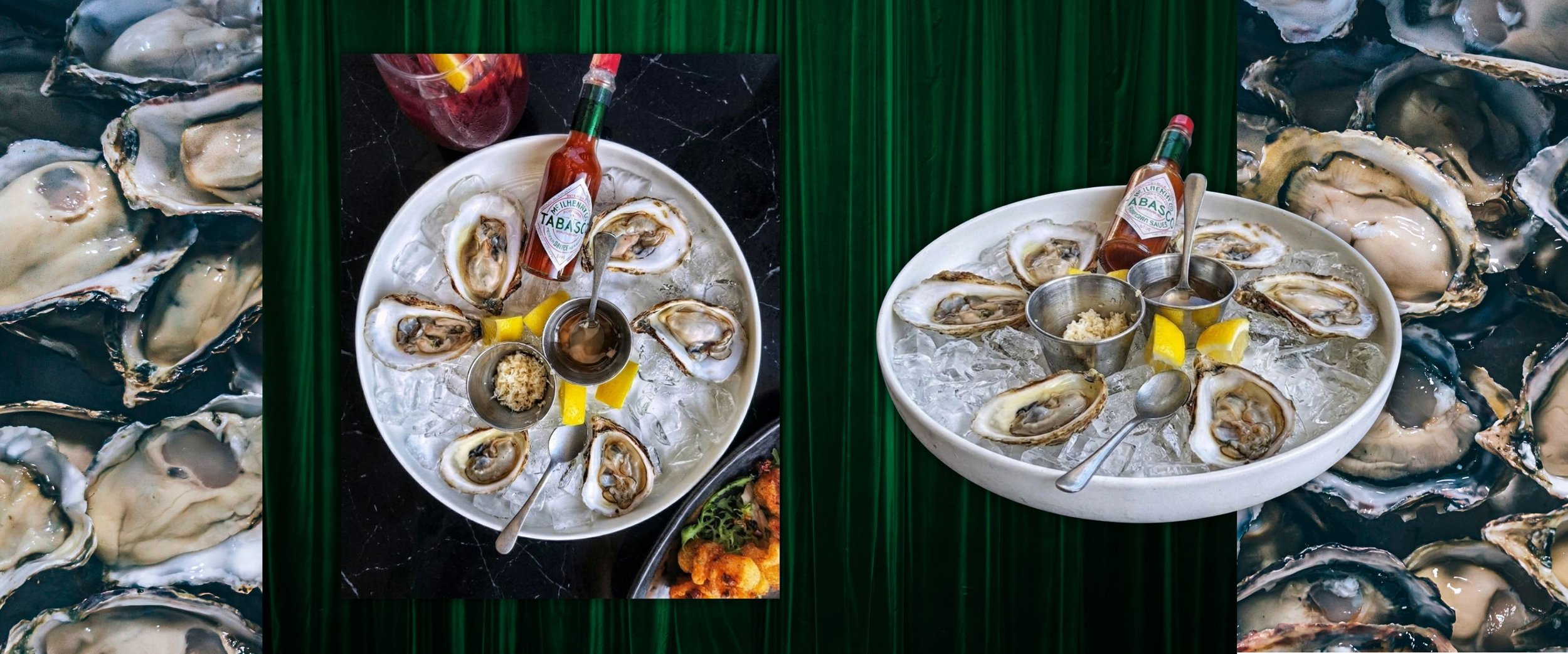 A white platter with ice and open oysters topped with lemon wedges, cocktail sauce, grated horseradish, and small metal containers of dipping sauces on a black table.