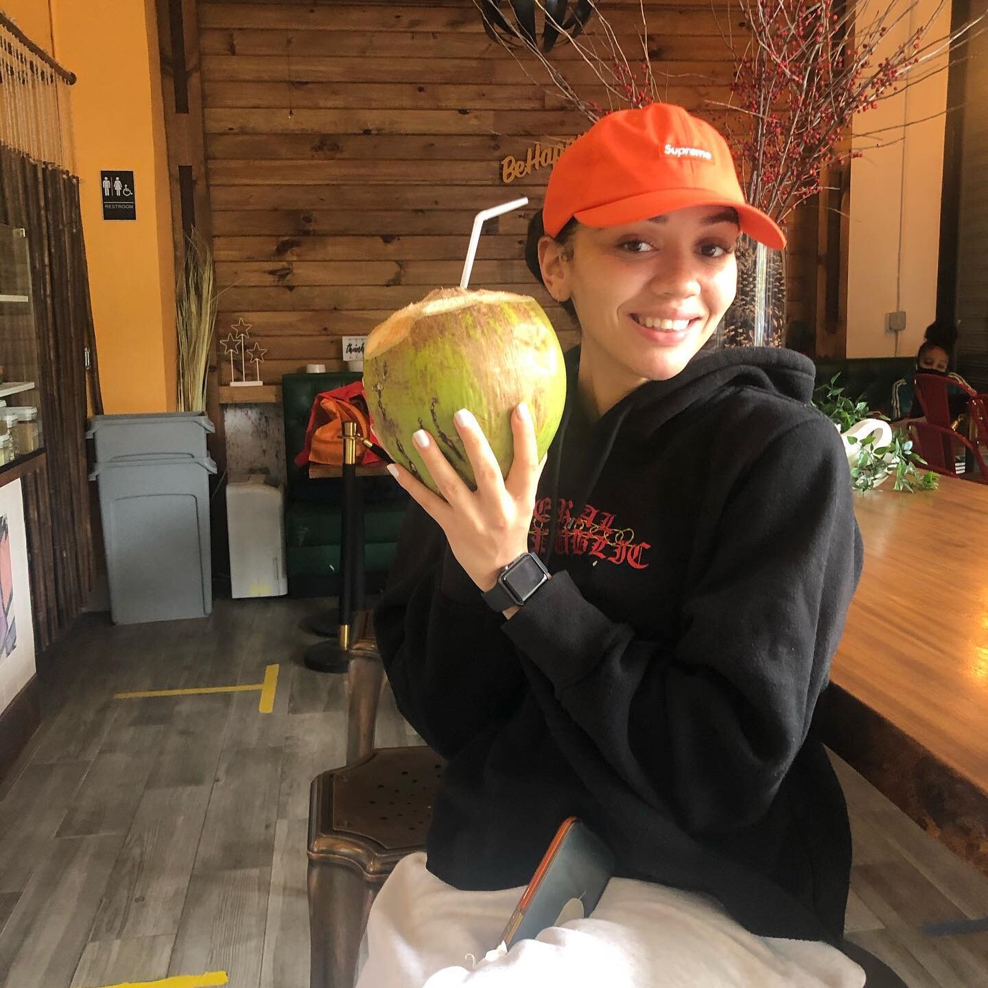 Salome enjoying her fresh coconut water