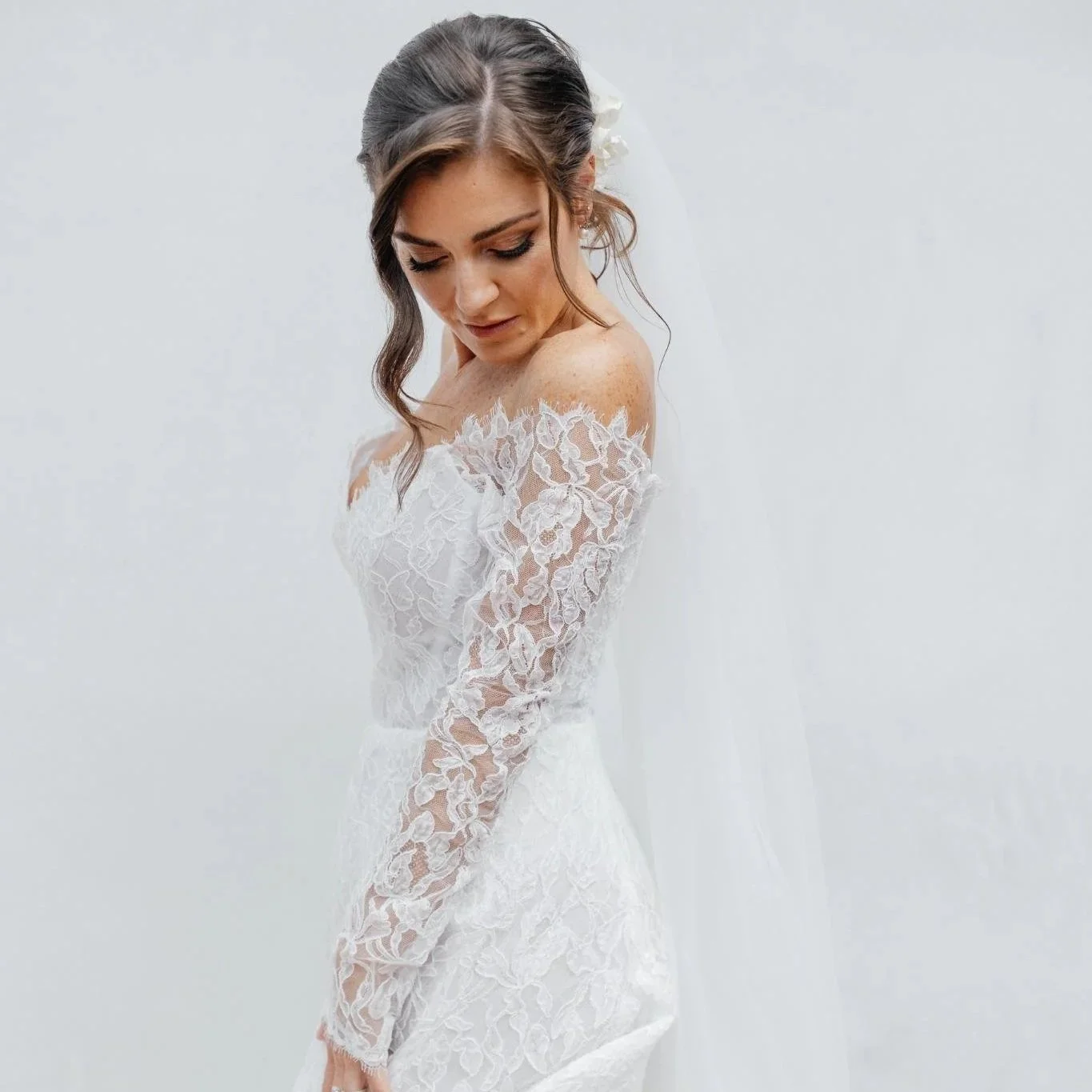 Bride portrait in lace wedding gown with veil at private estate wedding in Rolling Hills Estates