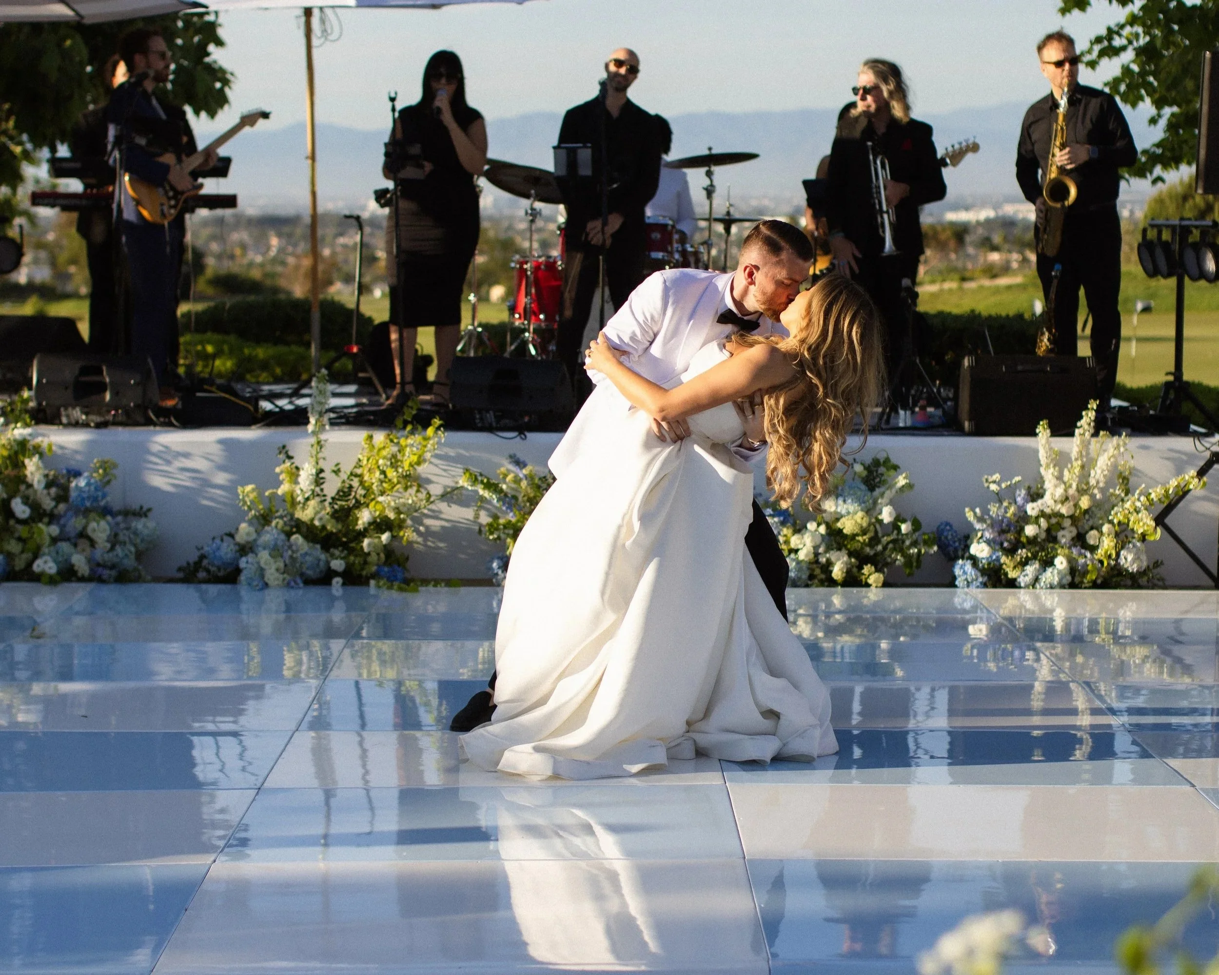 Bride and groom sharing their first dance at their Rolling Hills Country Club wedding reception in Palos Verdes.