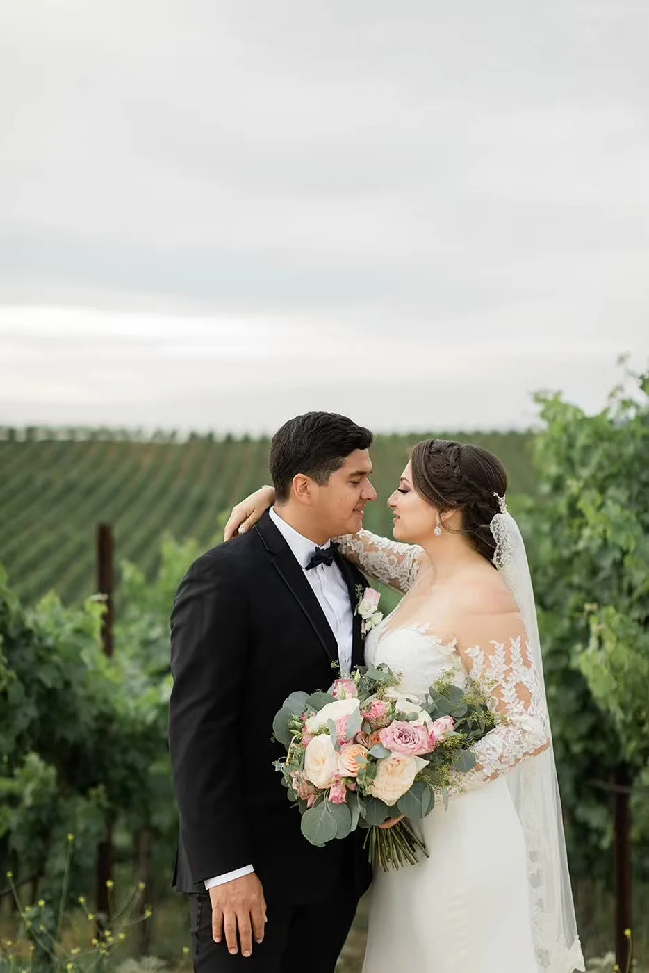 Bride and groom portrait in vineyard at Callaway Winery wedding in Temecula