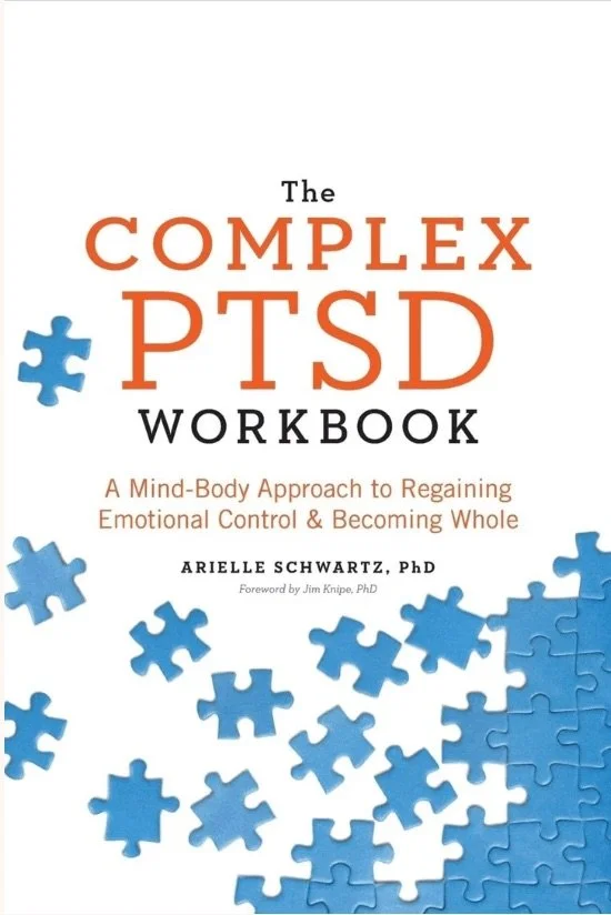 Book cover titled "The Complex PTSD Workbook" by Arielle Schwartz, PhD, featuring puzzle piece graphics in shades of blue.