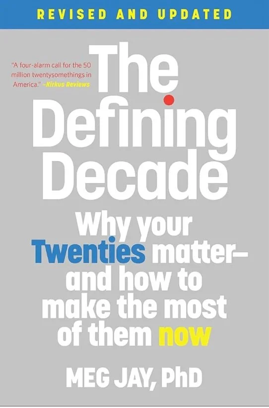 Book cover titled 'The Defining Decade: Why your Twenties matter and how to make the most of them now' by Meg Jay, PhD, with a quote from Kirkus Reviews, and a note in yellow at the top indicating 'Revised and Updated'.