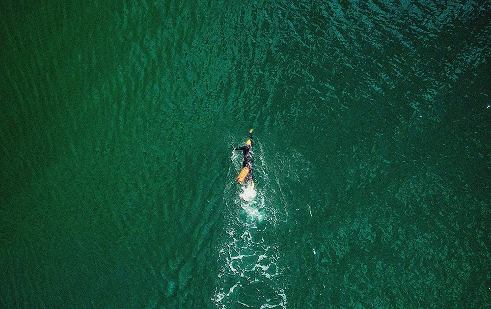 Aerial view of a person swimming.