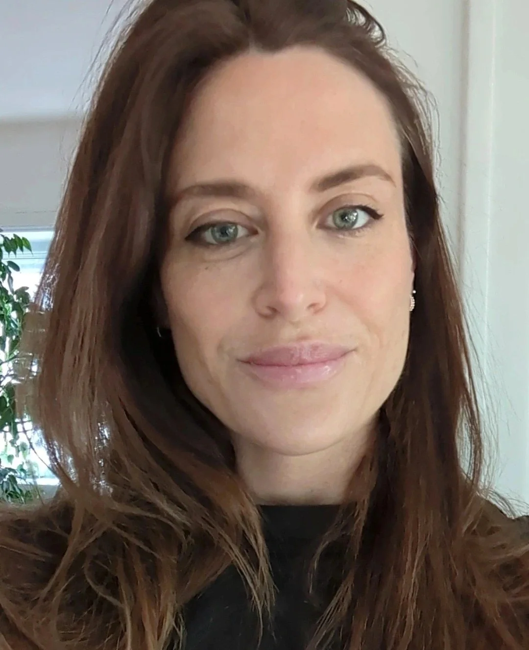Picture of Katryn Harpur smiling with white background