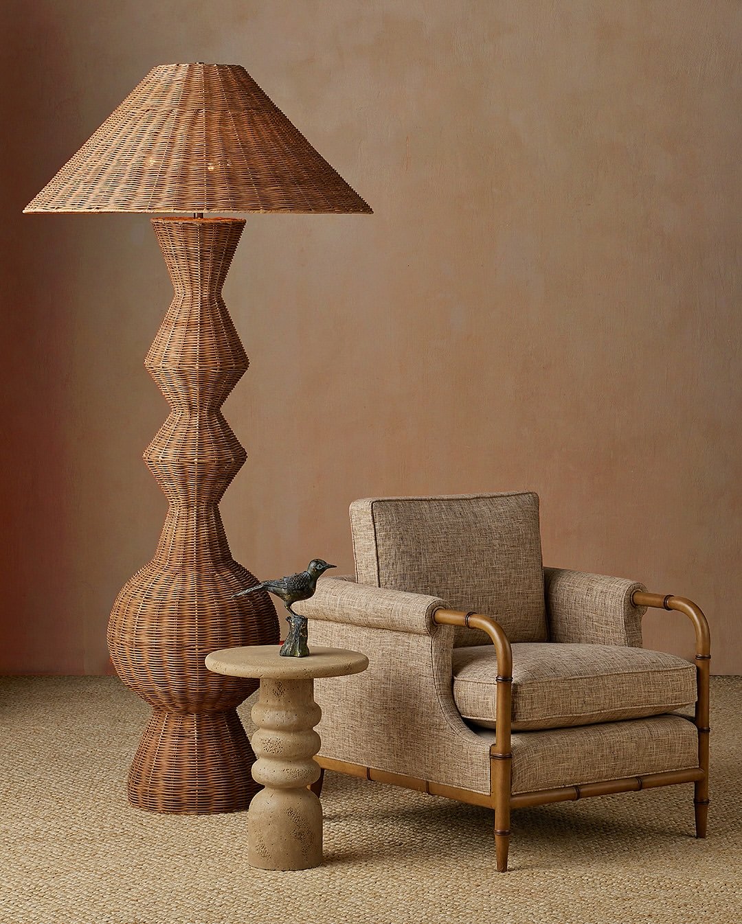 Commanding presence, organic soul&mdash;meet the Nirvana Grande Floor Lamp from @curreyco.

Its oversized geometric frame showcases stripped cane rattan with a matte finish, while the flared empire shade in thick rattan nods to Asian craftsmanship. T