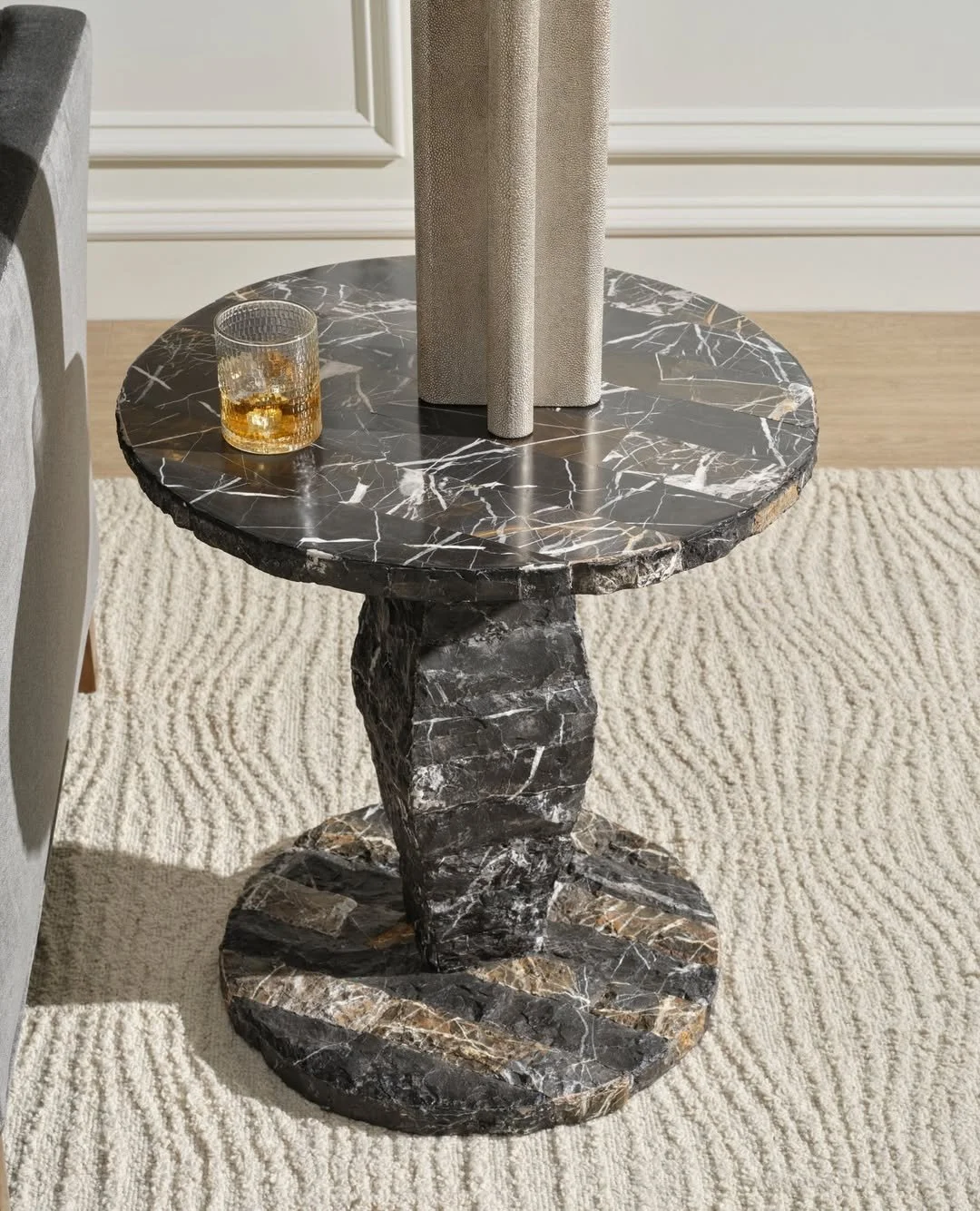 Alternating tones of marble give the Maxfield side table from @madegoods its irresistible, offbeat charm &mdash; a sculptural accent with just the right amount of eccentricity. Bold enough to stand out, refined enough to elevate any thoughtfully cura