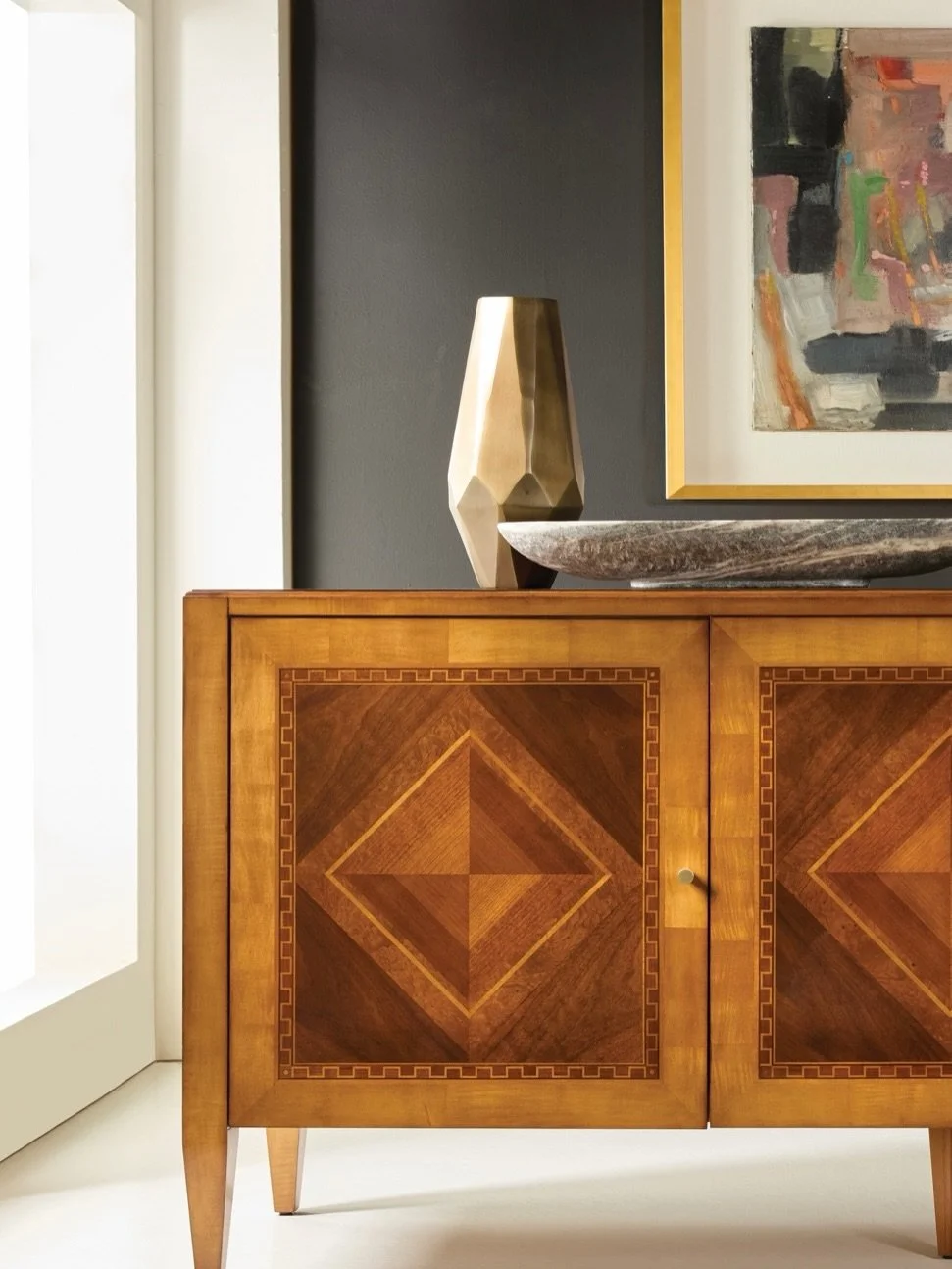 Storage, designed to stand out.

The Ferrara Sideboard (MH1280F01) from @modernhistoryfurniture transforms craftsmanship into a visual statement. An intricate geometric composition of richly varied woods fits together like a finely made puzzle, revea