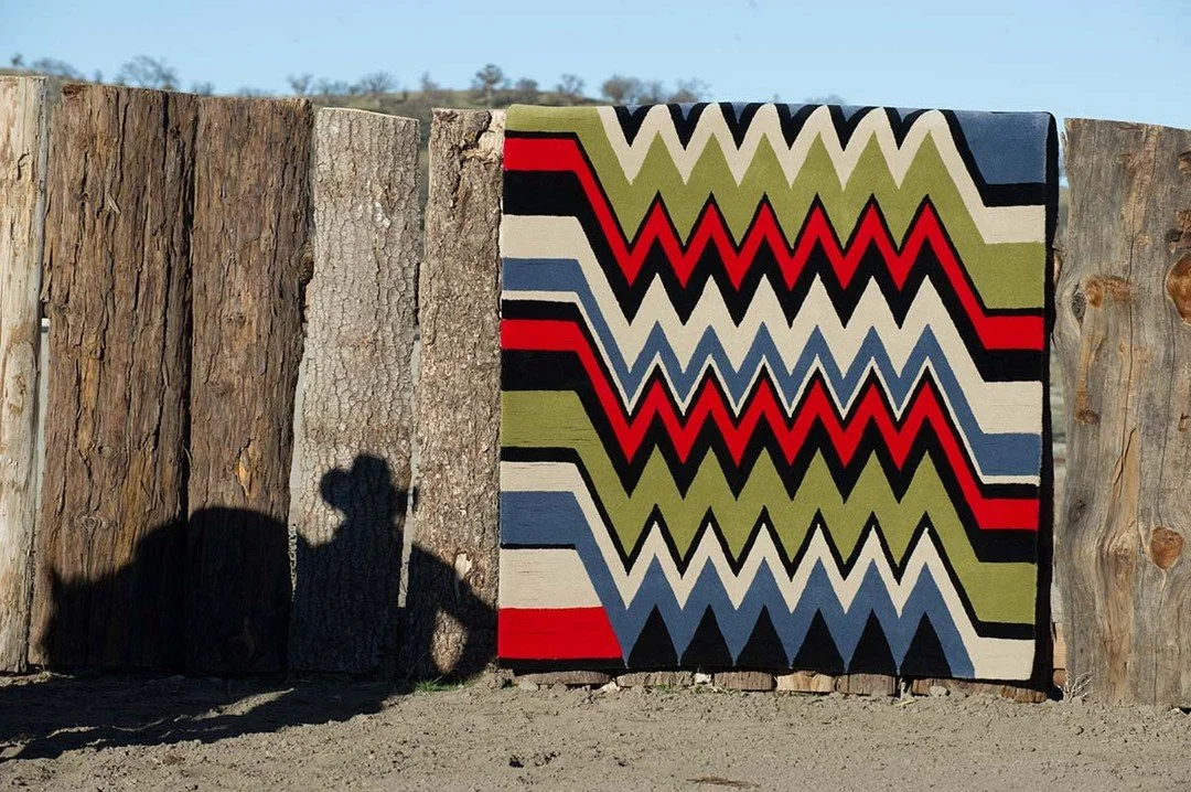 Pattern with a Past

Inspired by the graphic language of traditional saddle blankets, this @creative_accents design SADDLE BLANKET carries a sense of heritage, movement, and place. Bold zigzags, earthy color, and strong geometry give the rug a collec
