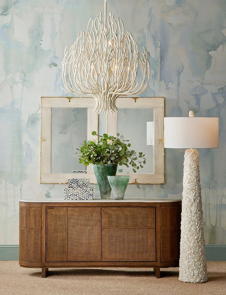 New for Spring 2026, the Seaward Extra Large Chandelier from @curreyco transforms wrought iron into something almost oceanic.

Sculpted to resemble white coral, its flowing ribs curve with a fluid, organic rhythm before gathering into a textured ring