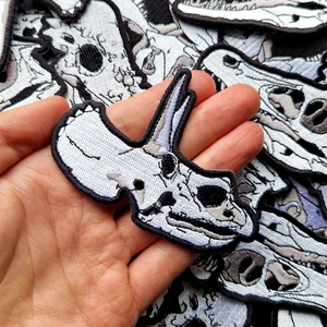 triceratops embroidery patch / triceratops skull embroidered patch.  Dinosaur embroidery patches. — Sketched by Ste