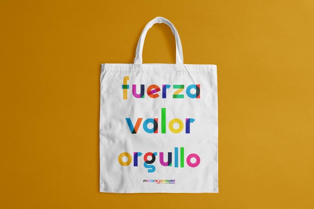 Strength, Courage, Pride Tote Bag written in Spanish with rainbow letters.
