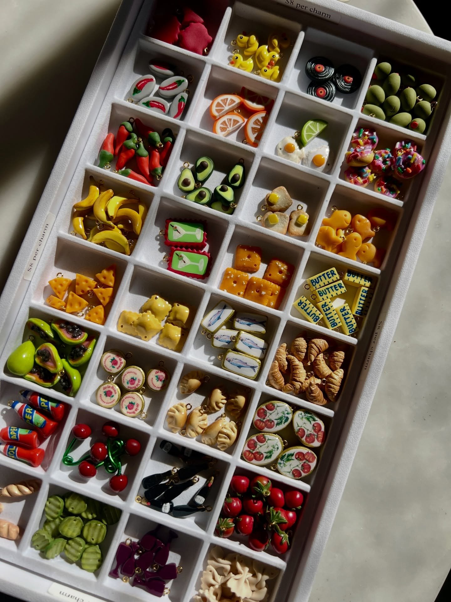 Can you tell I love food? 
Snacks and food themed creations definitely are a big part of what I make, and idk what to say other than I love a good food charm. What food related charms should I make next?