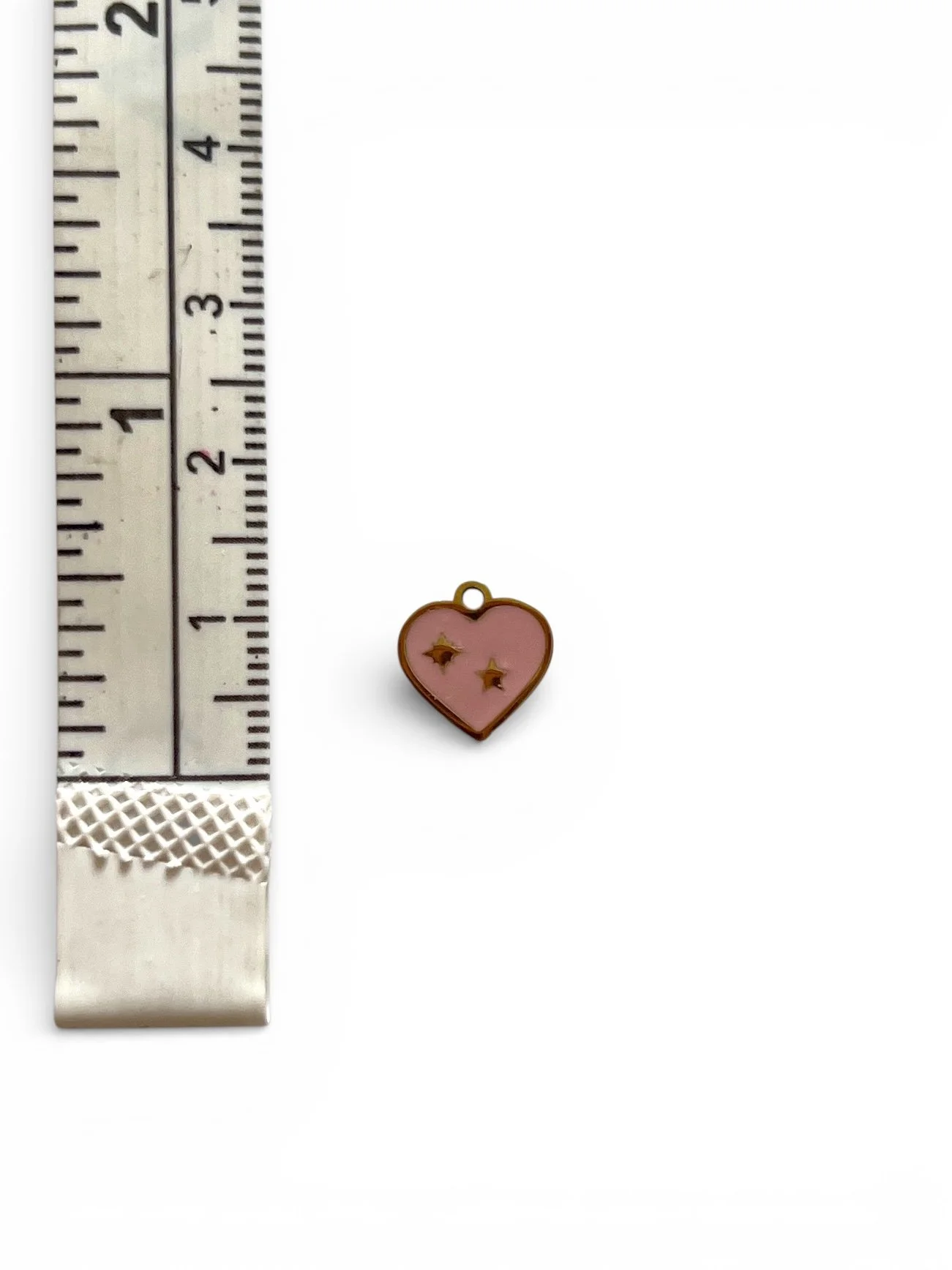 small gold and pink heart charm