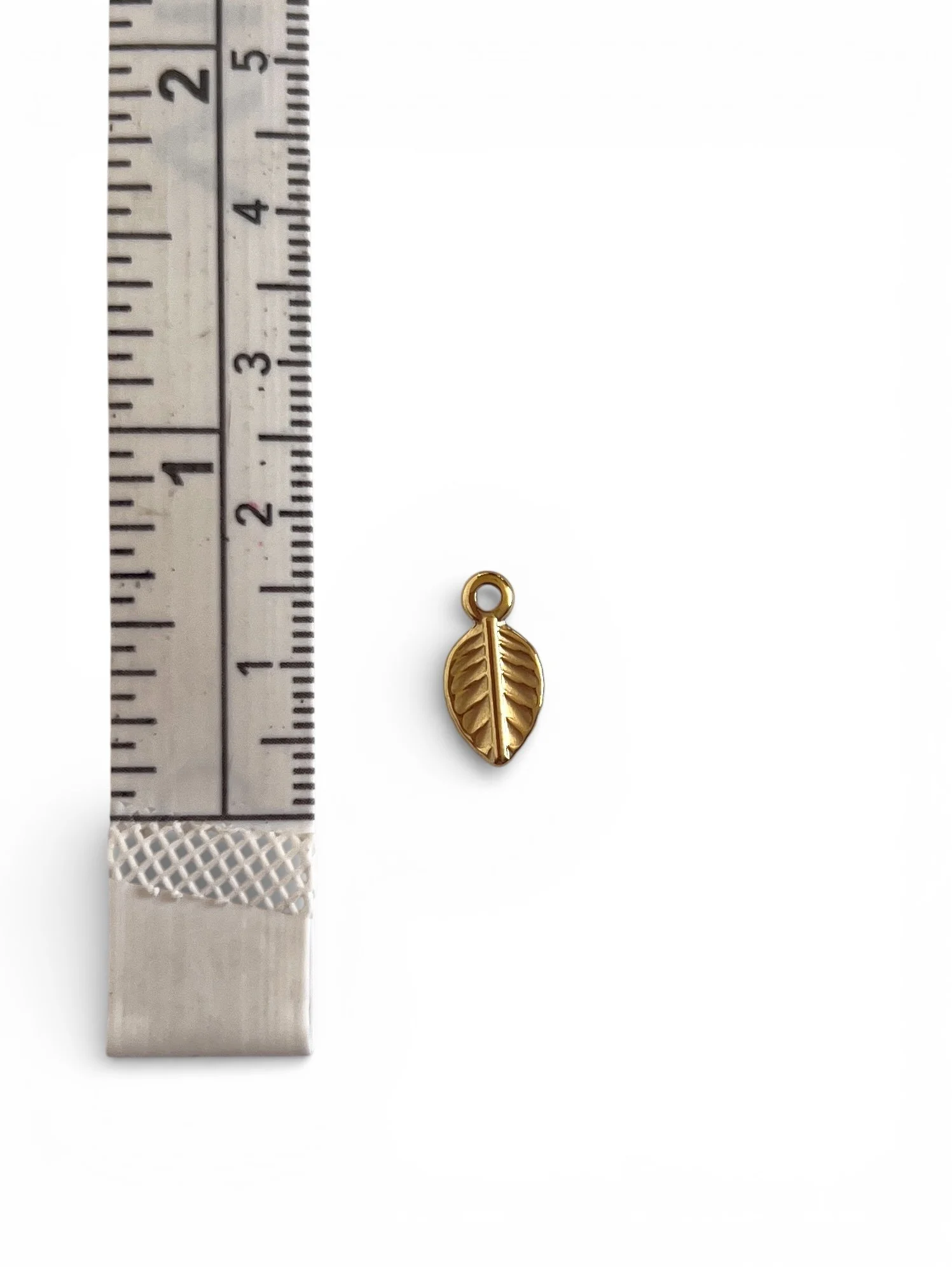 Small gold leaf charm
