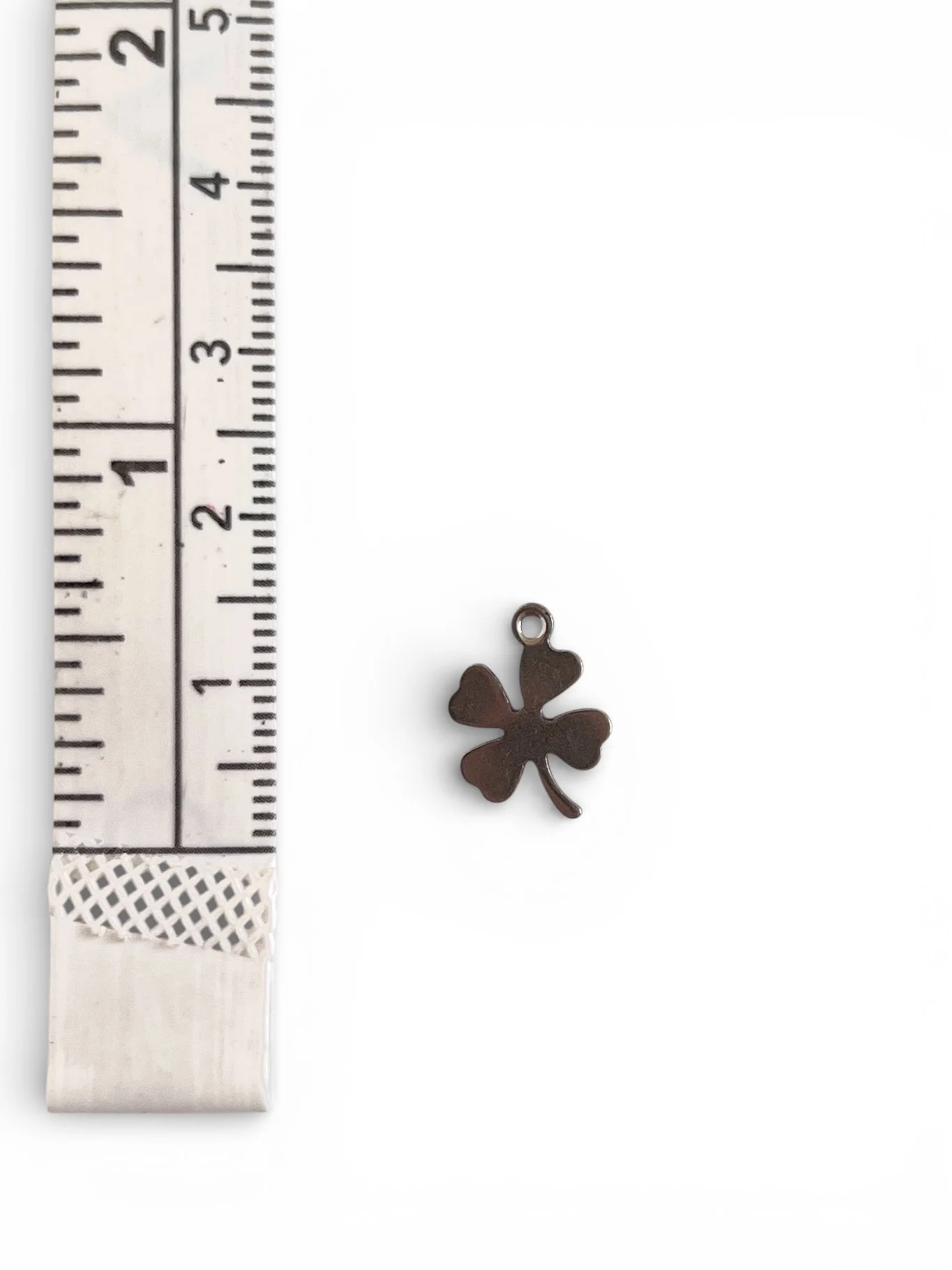 Small silver four leaf clover charm