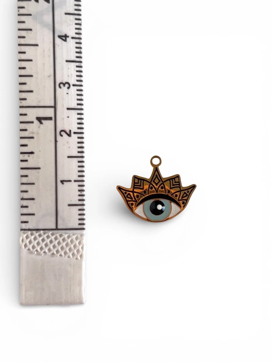 Gold crown charm with blue evil eye center