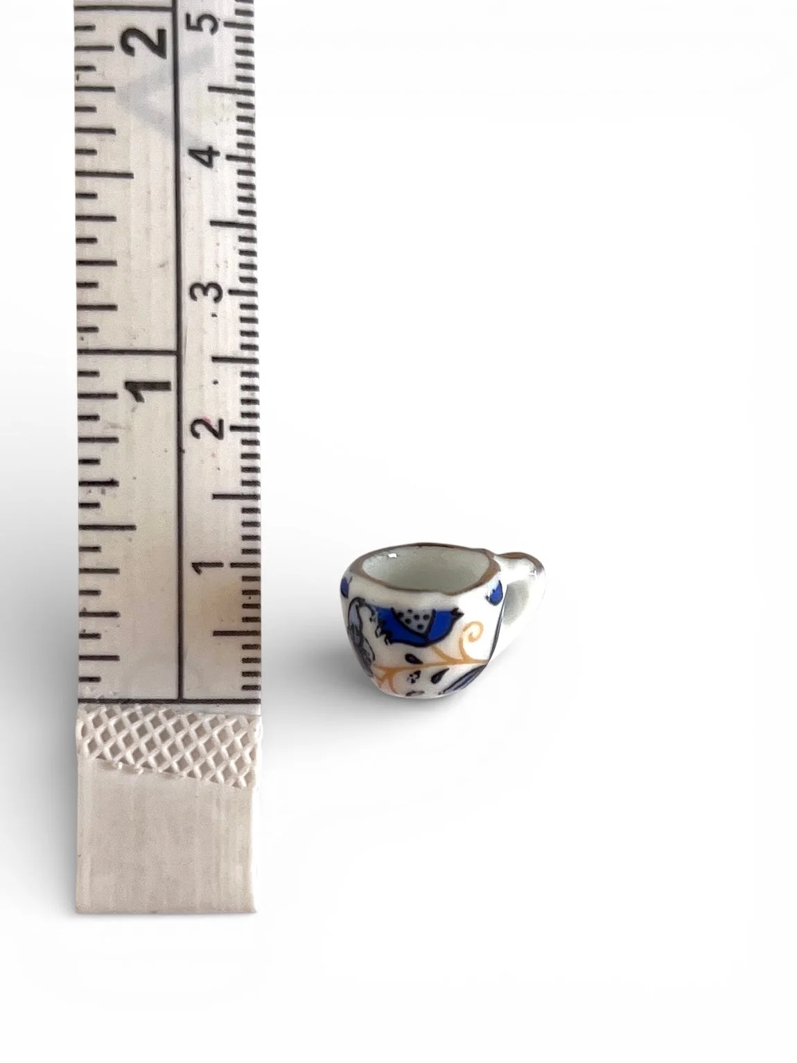 painted porcelain teacup charm